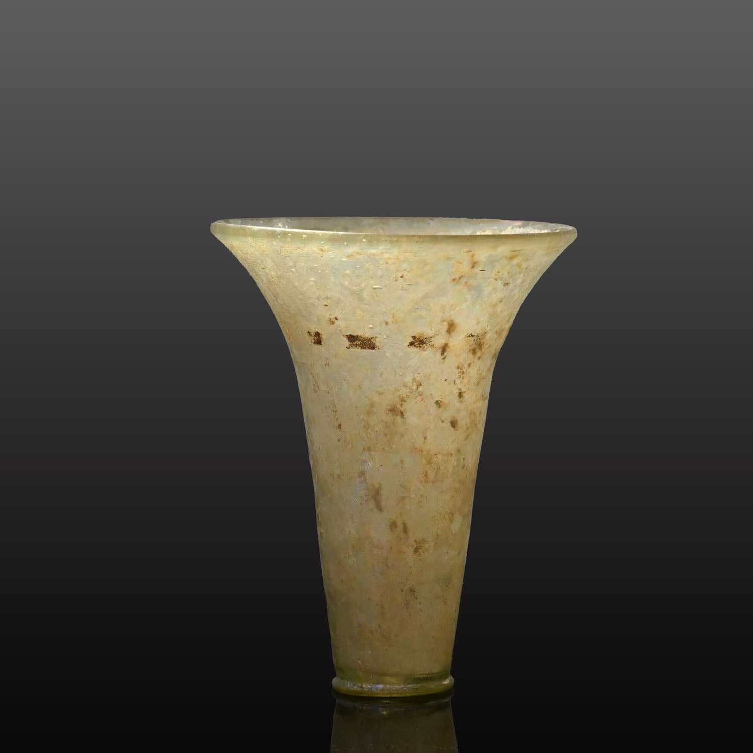 A fine Islamic Glass Beaker, Mamluk Period, ca. 13th - 14th century CE