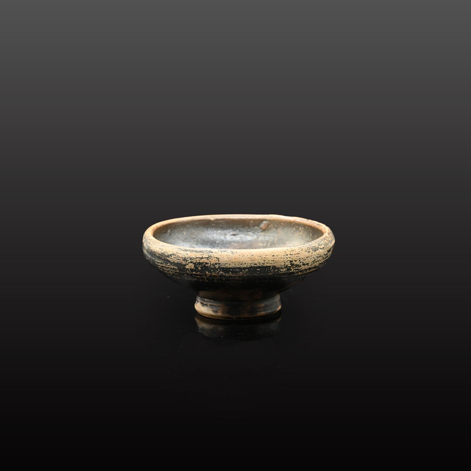 A small Greek Blackware Salt Dish, , ca. 4th century BCE