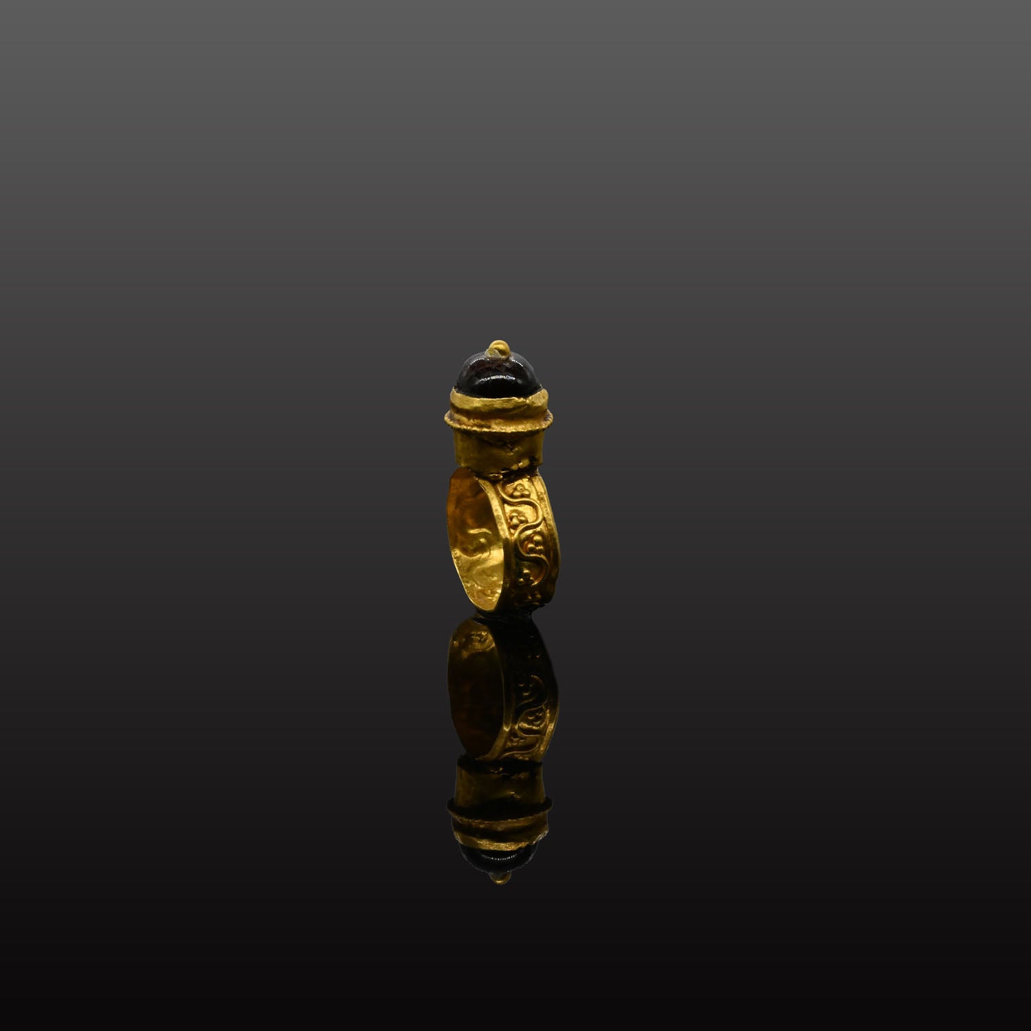 A Byzantine Garnet and Gold Domed Finger Ring, Byzantine Empire, ca. 5th - 7th century CE