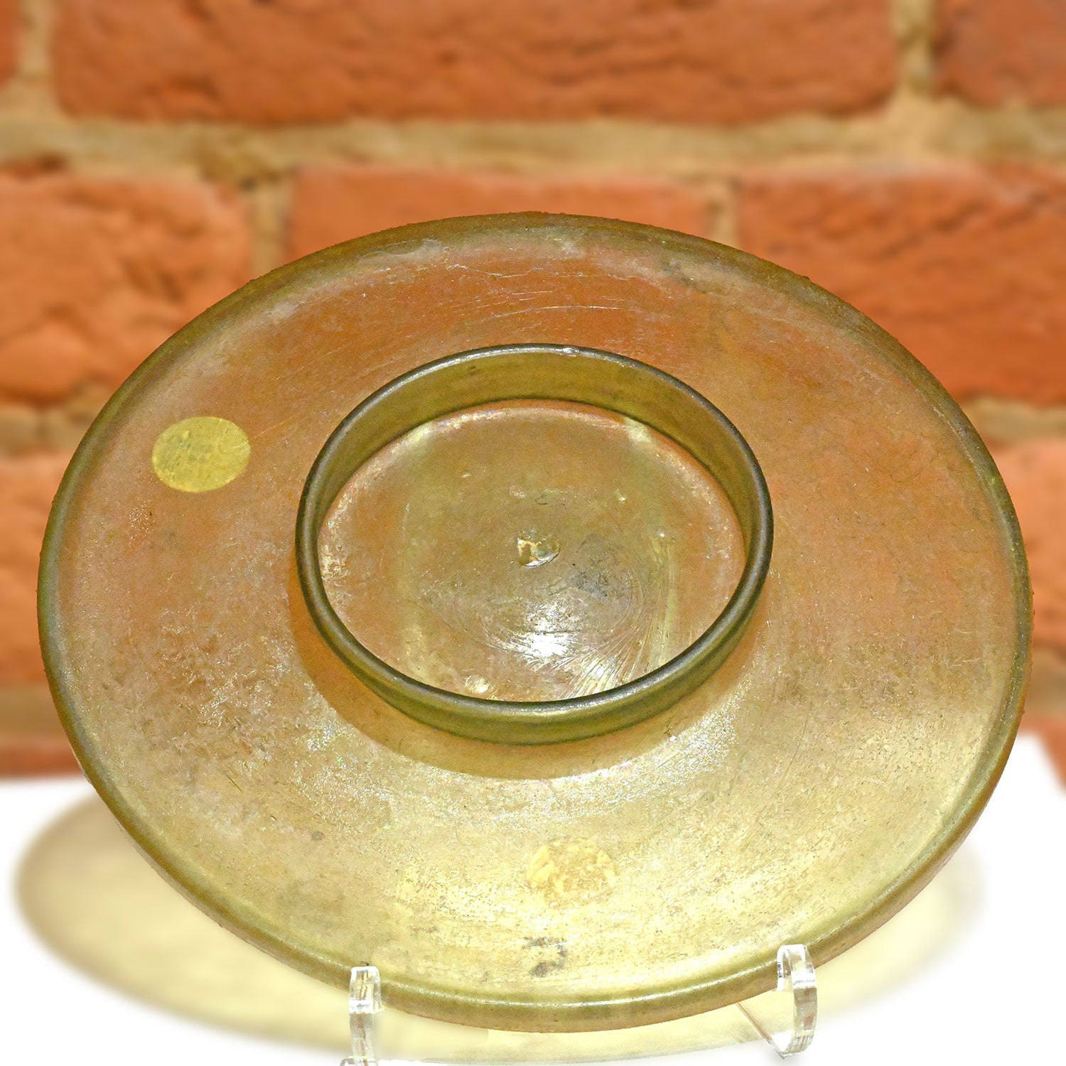 A Roman Yellow Glass Plate, Roman Imperial Period, ca. 1st century CE