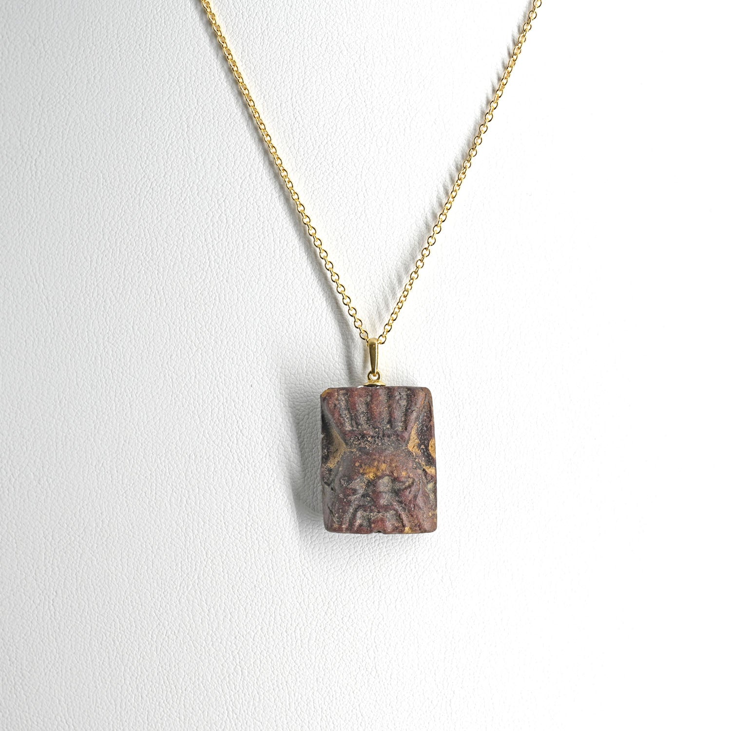 An Egyptian Faience Bes Plaque, Late Period, ca. 664 - 332 BCE