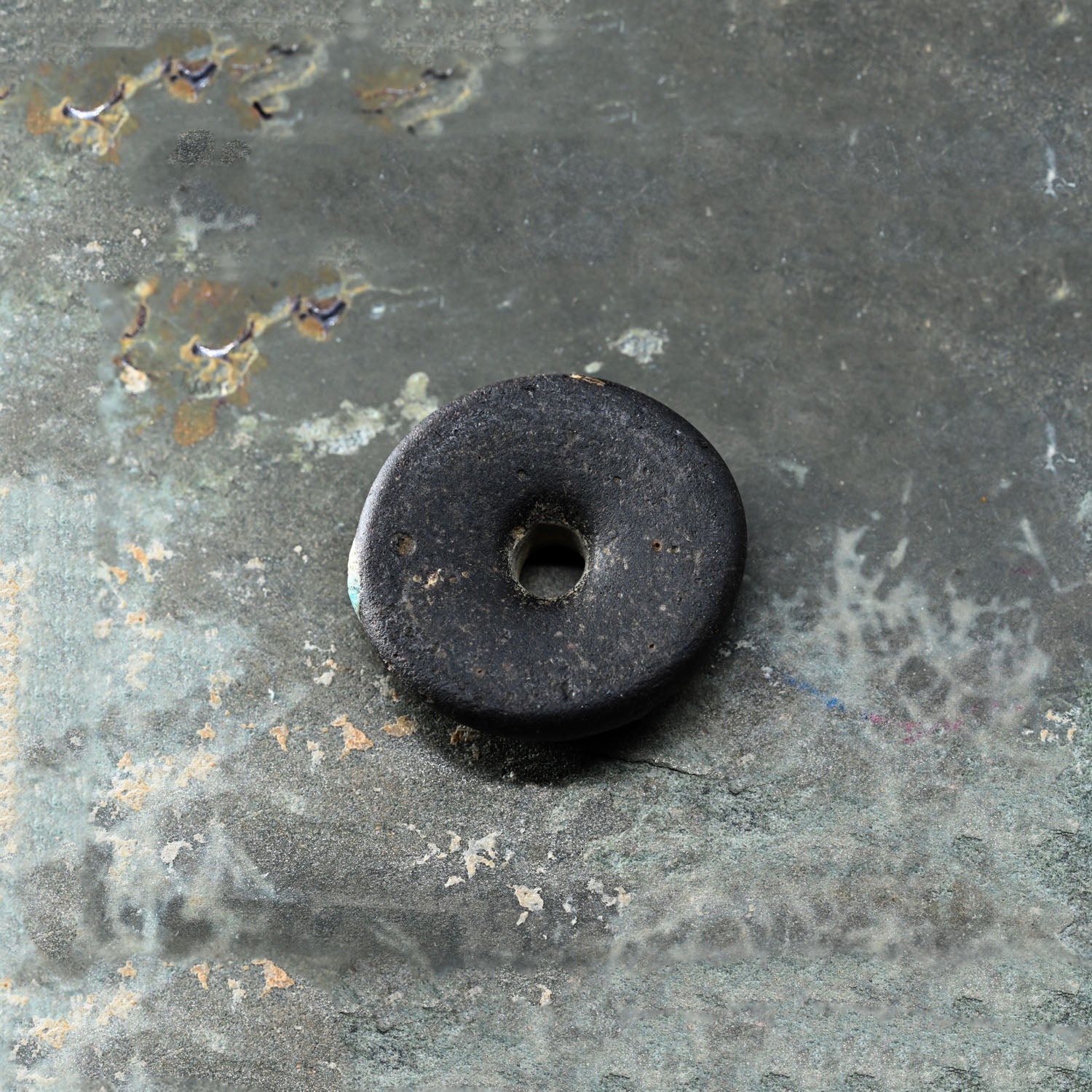 A Roman Decorated Glass Spindle Whorl, Roman Imperial Period, ca. 2nd - 3rd century CE