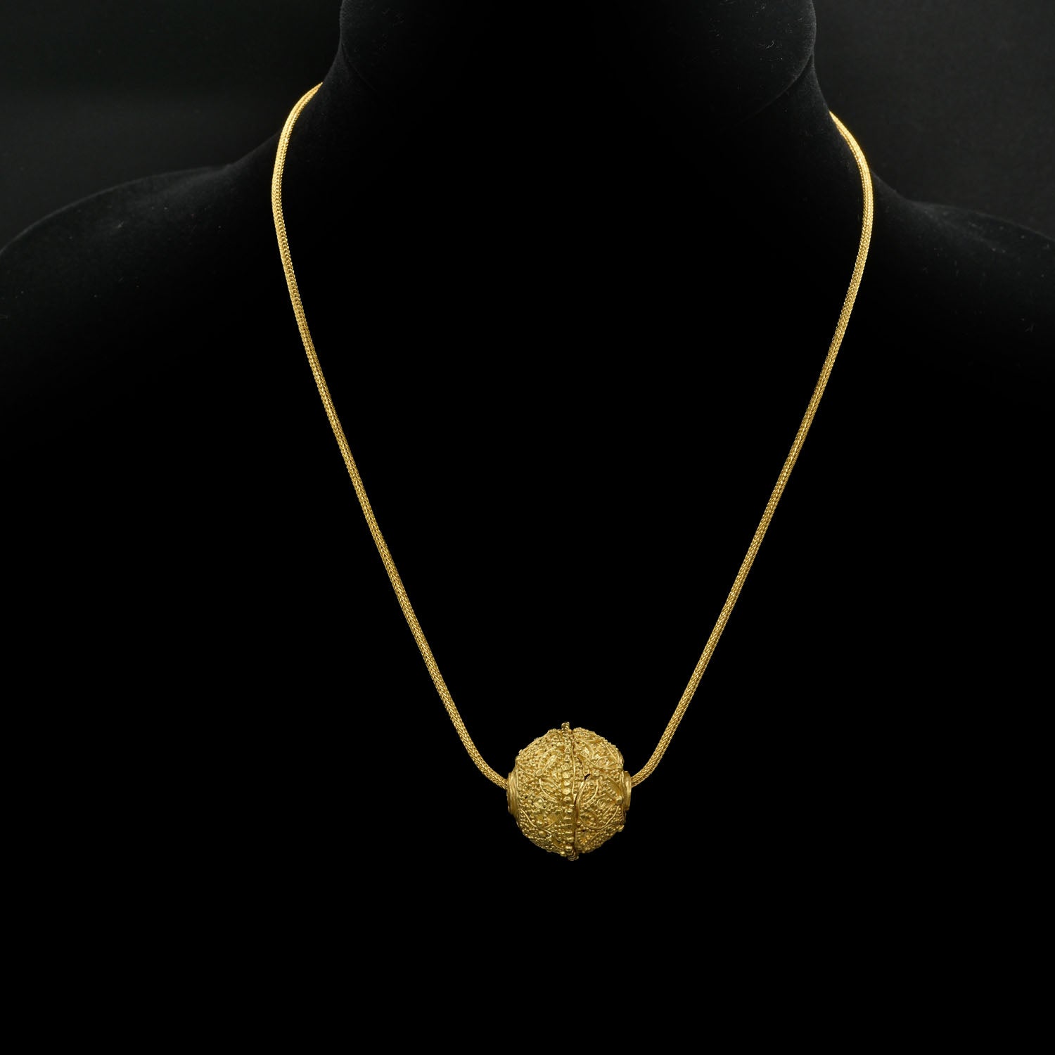 A Greek Gold Filigree Bead, Hellenistic Period, ca. 3rd - 1st century BCE