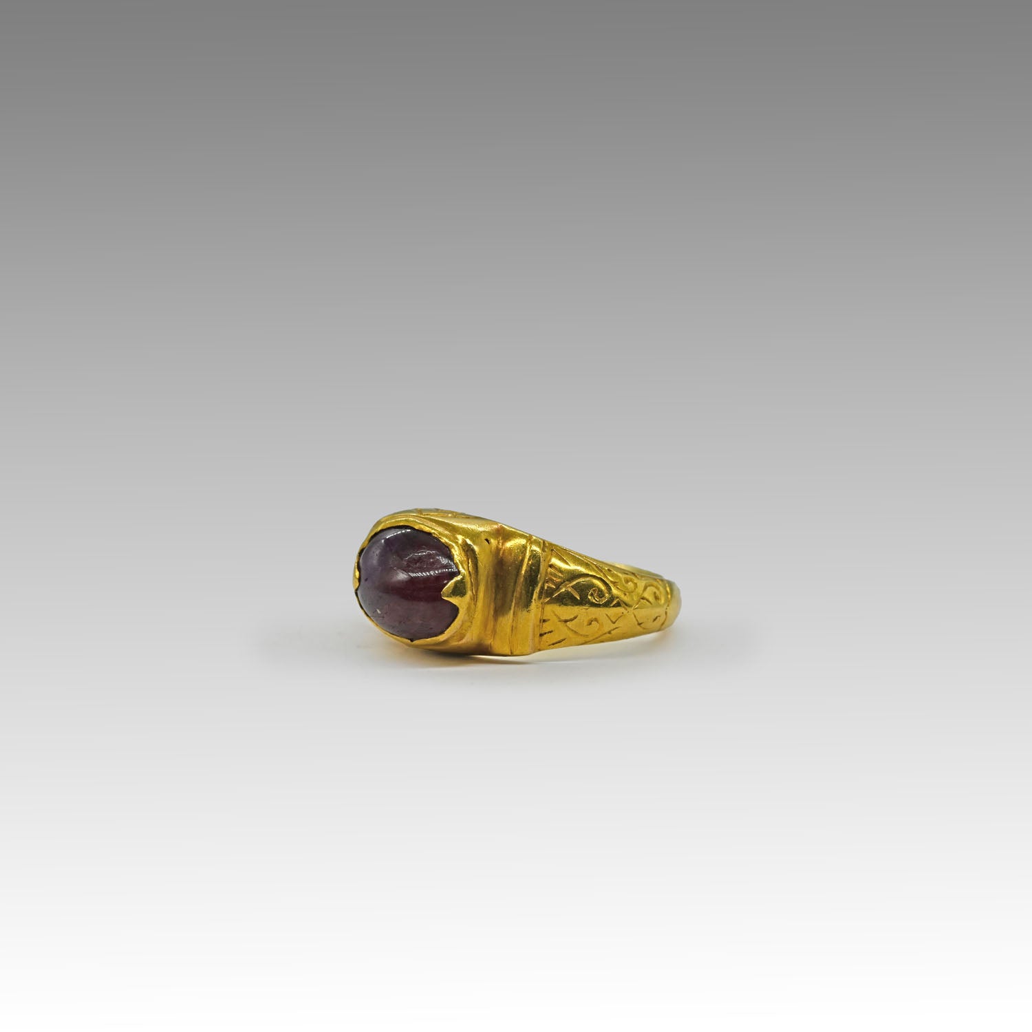 A Prized Late Roman Gold and Ruby Finger Ring, ca. 3rd - 4th century CE