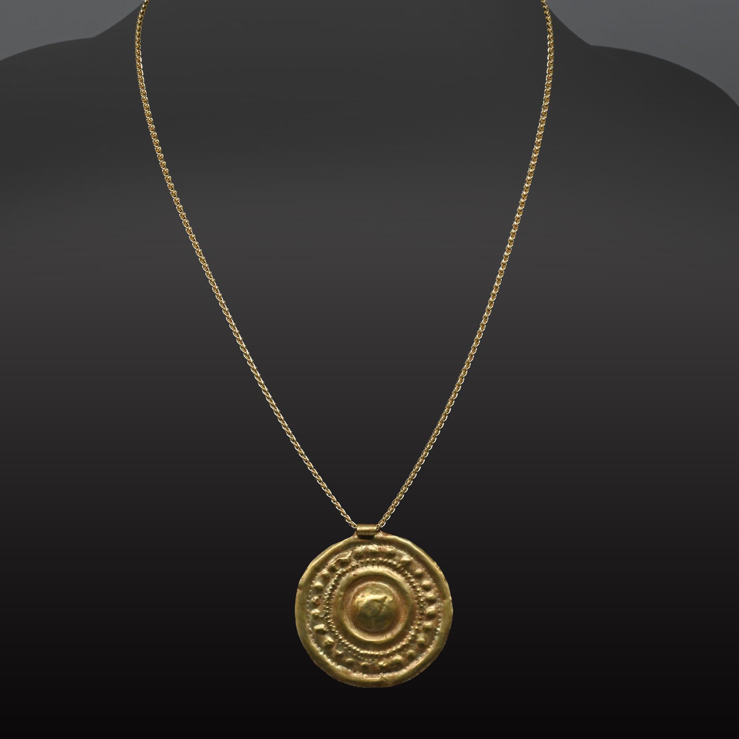 A large Western Asiatic Gold Disk Pendant, ca late 2nd Millennium BCE