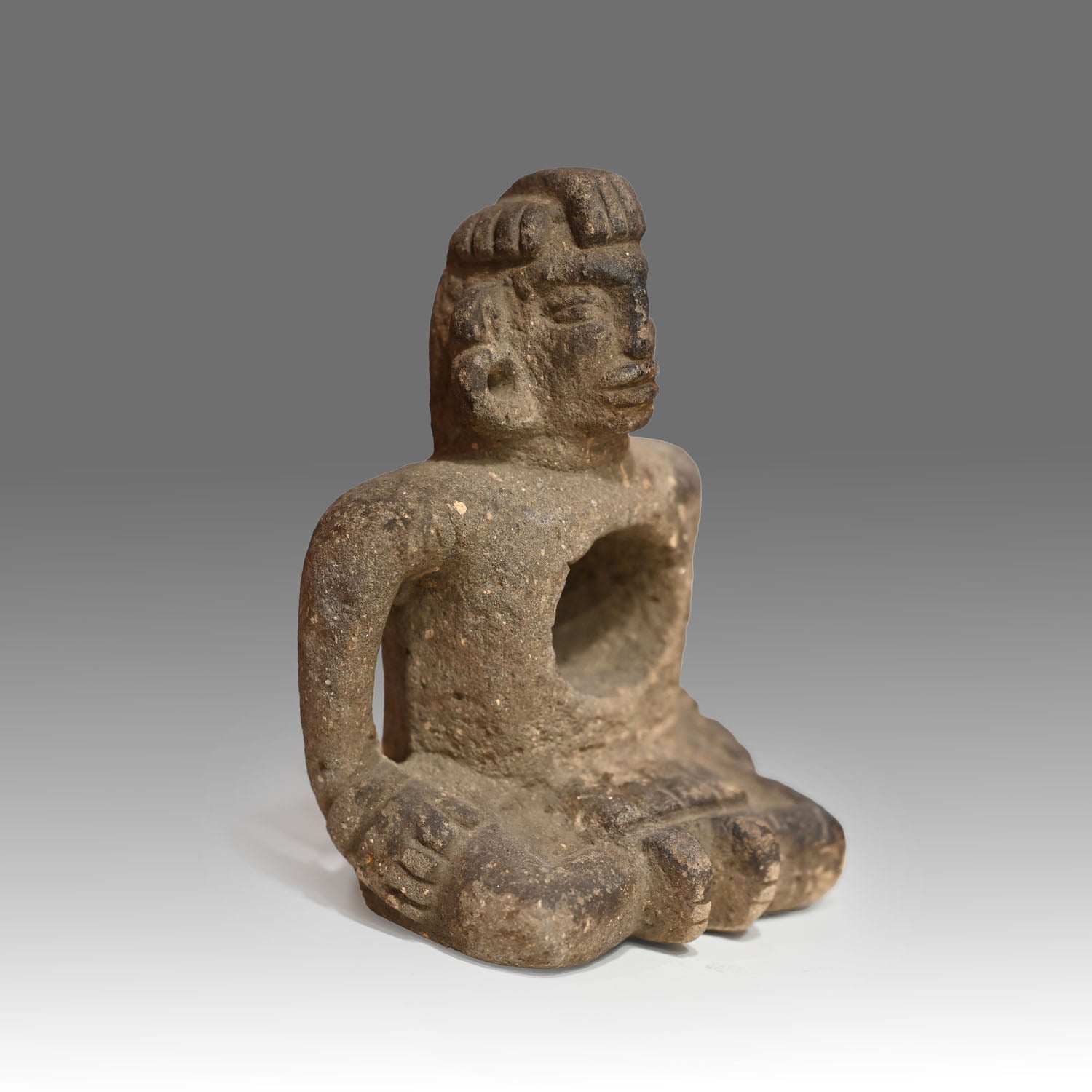 Maya Sandstone Seated Deity Figure, ca. 200 - 500 CE