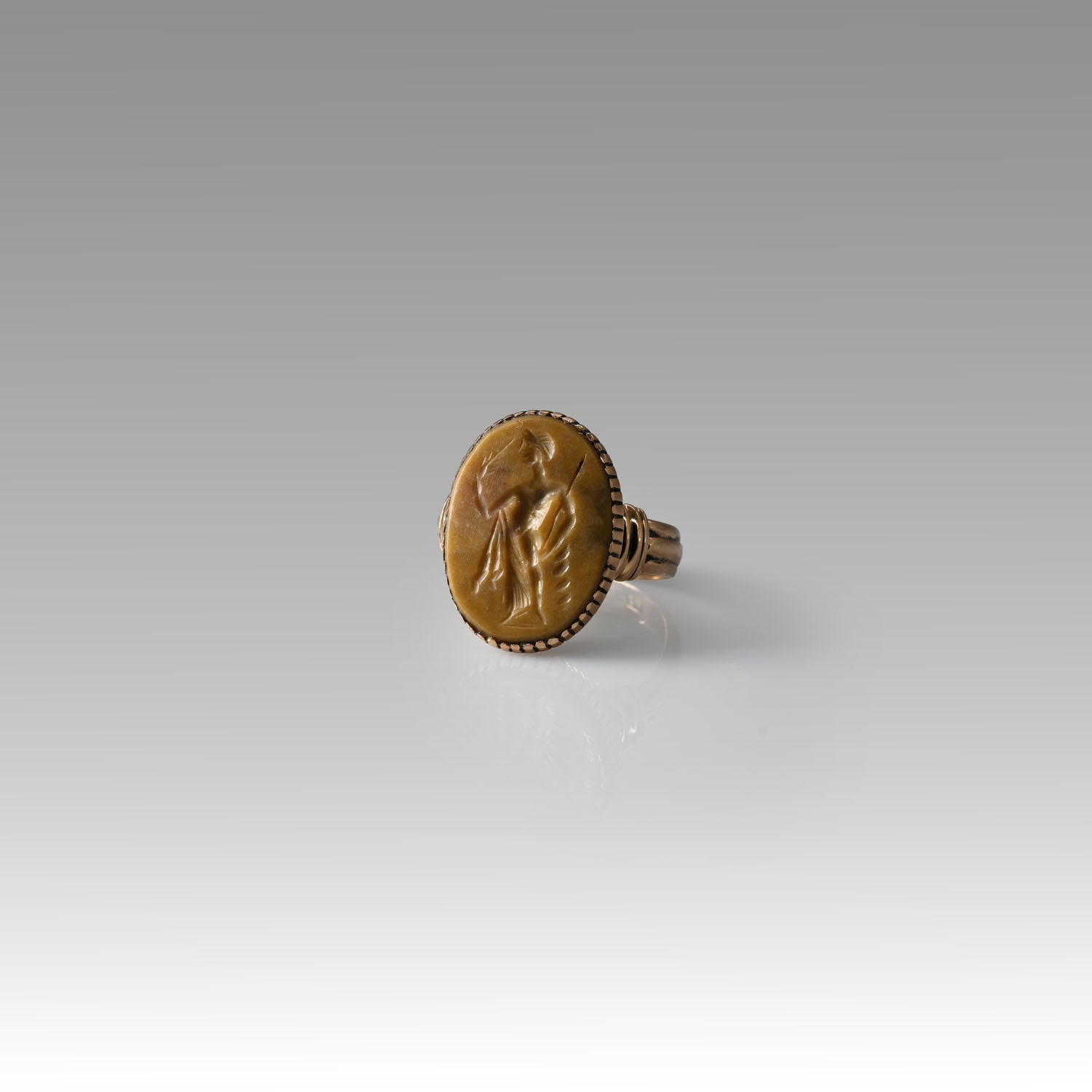 A Roman Yellow Jasper Intaglio of Apollo, Roman Imperial Period, ca 1st - 2nd century CE