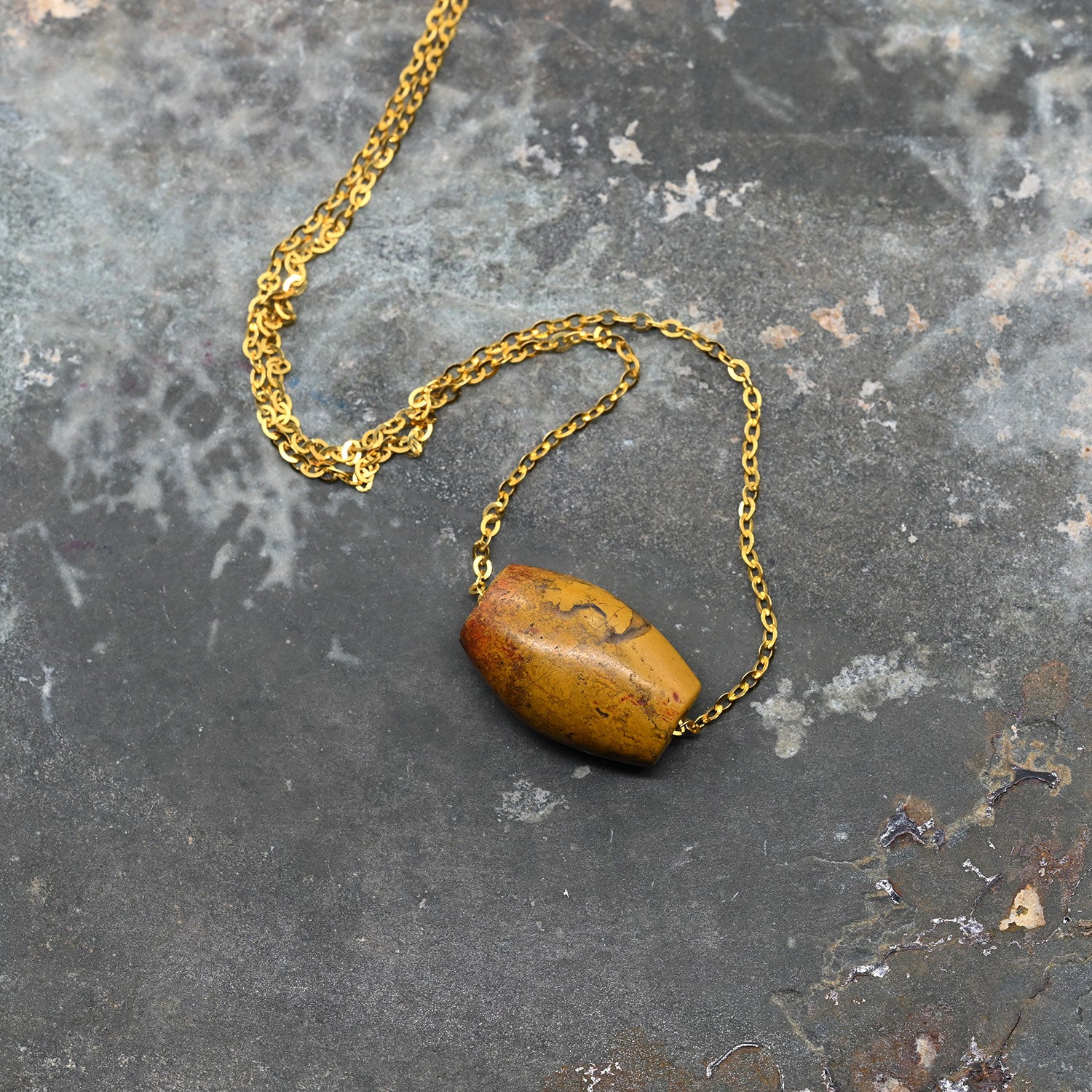 A rare Egyptian Yellow Jasper Bead Pendant, New Kingdom, 18th Dynasty, 1550-1295 BC