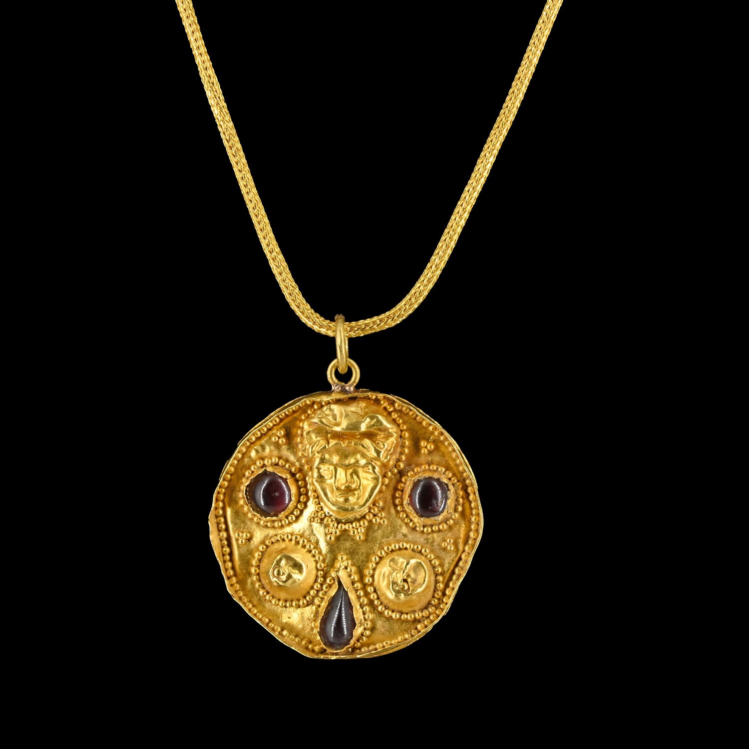 A Published Byzantine Gold, and Garnet Medallion, Byzantine Empire, ca. 4th - 6th century CE