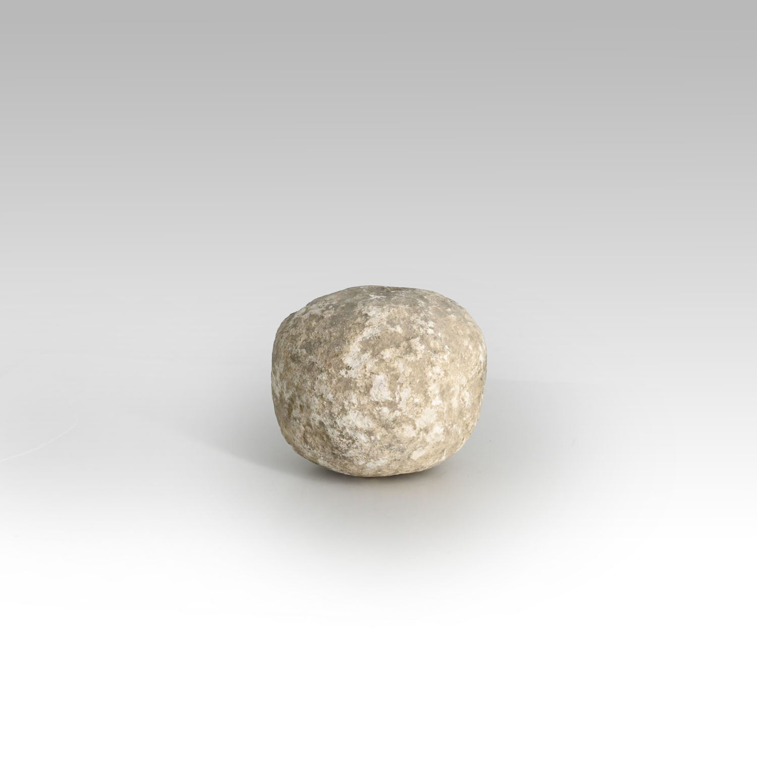 An Egyptian Limestone Stone Pounder, Old Kingdom, ca. 2543 - 2120 BCE