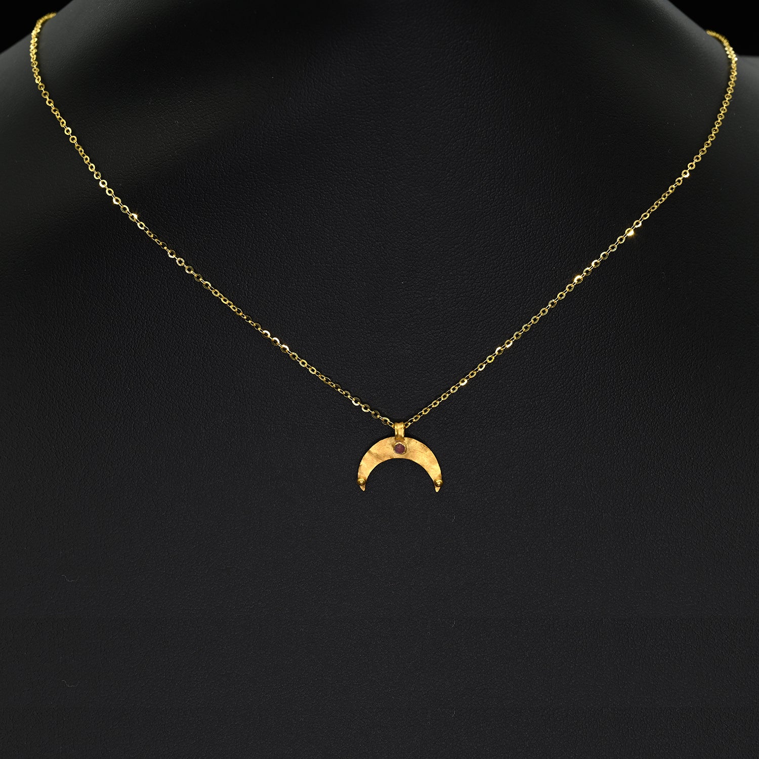 A Roman Gold and Garnet Lunar Pendant, Roman Imperial Period, ca. 2nd–3rd century CE