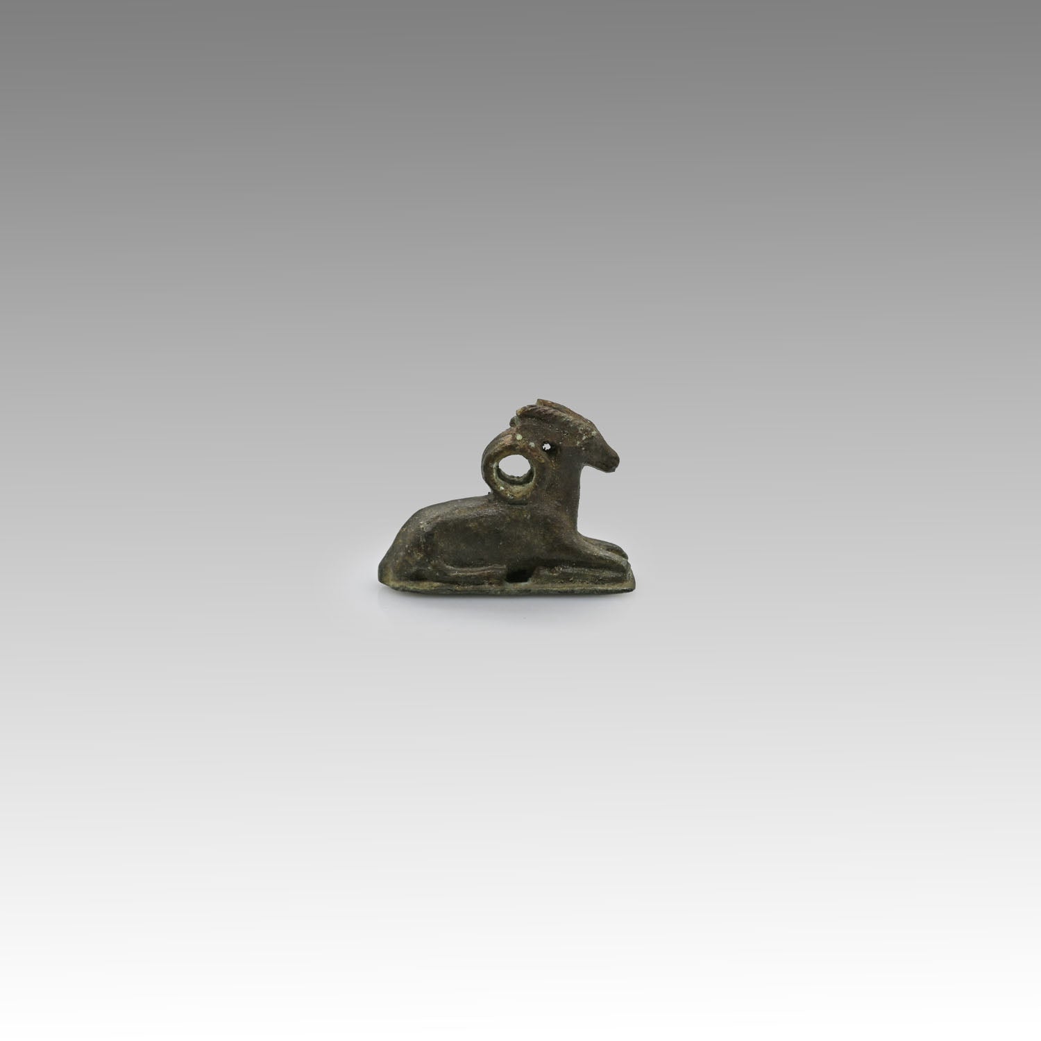 An Egyptian Bronze Weight in the form of a Ram, New Kingdom, Amarna Period , 18th Dynasty, ca 1352 - 1336 BCE