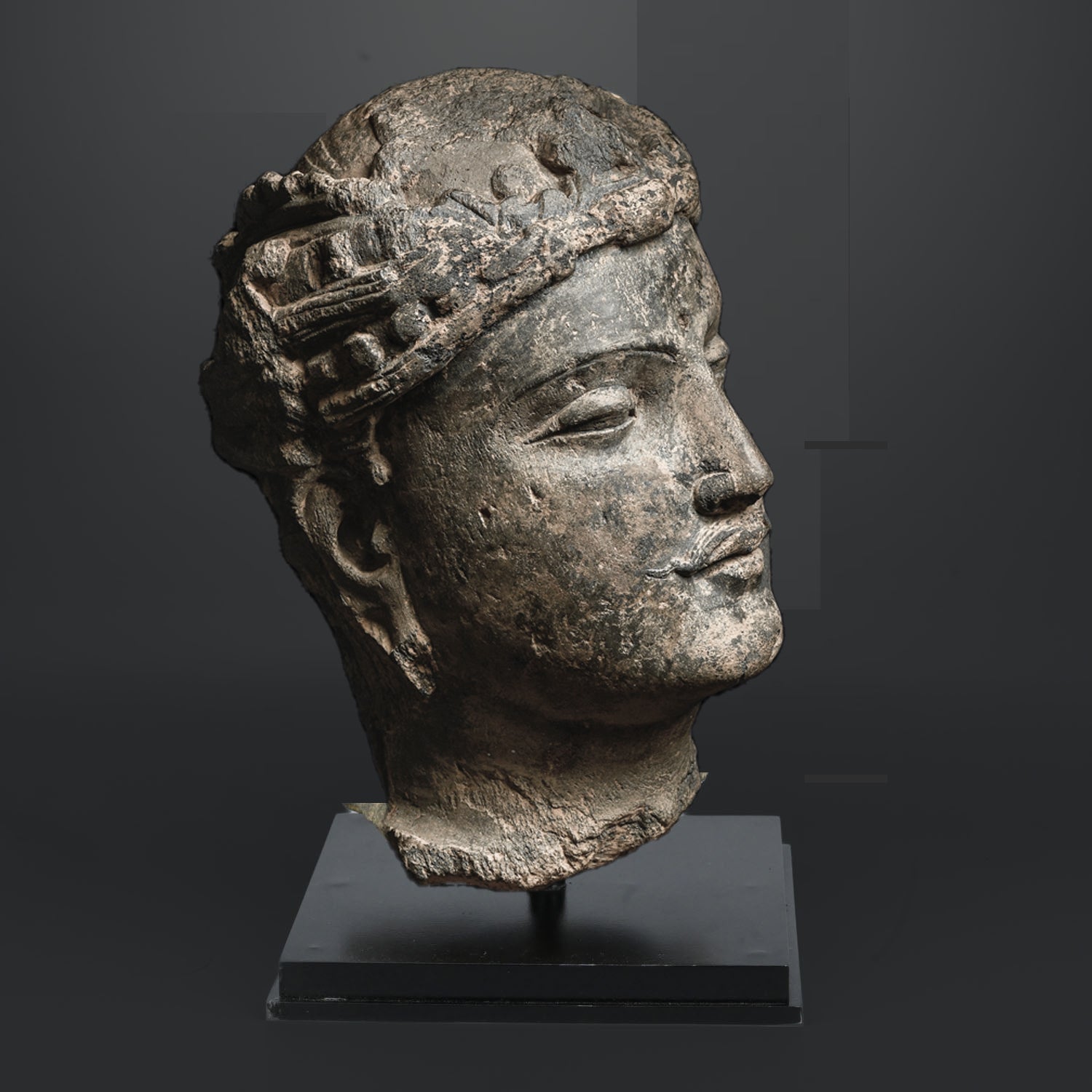 A fine Gandhara Grey Schist Head of a Bodhisattva, ca. 2nd - 3rd century CE