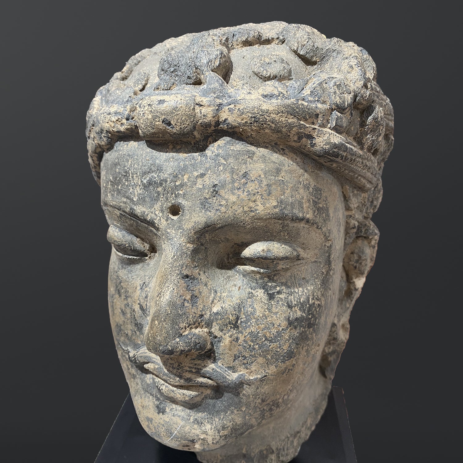 A fine Gandhara Grey Schist Head of a Bodhisattva, ca. 2nd - 3rd century CE