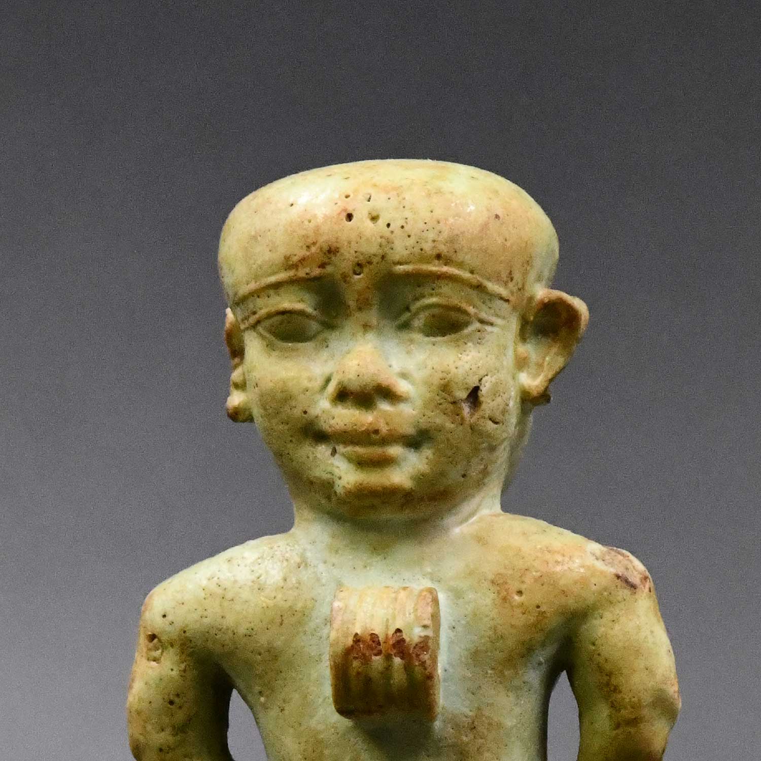 A fine Egyptian Faience Janus Amulet of Pataikos, Late Period, ca. 664 - 332 BCE