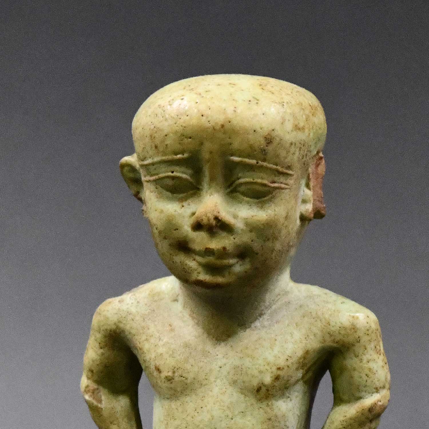 A fine Egyptian Faience Janus Amulet of Pataikos, Late Period, ca. 664 - 332 BCE