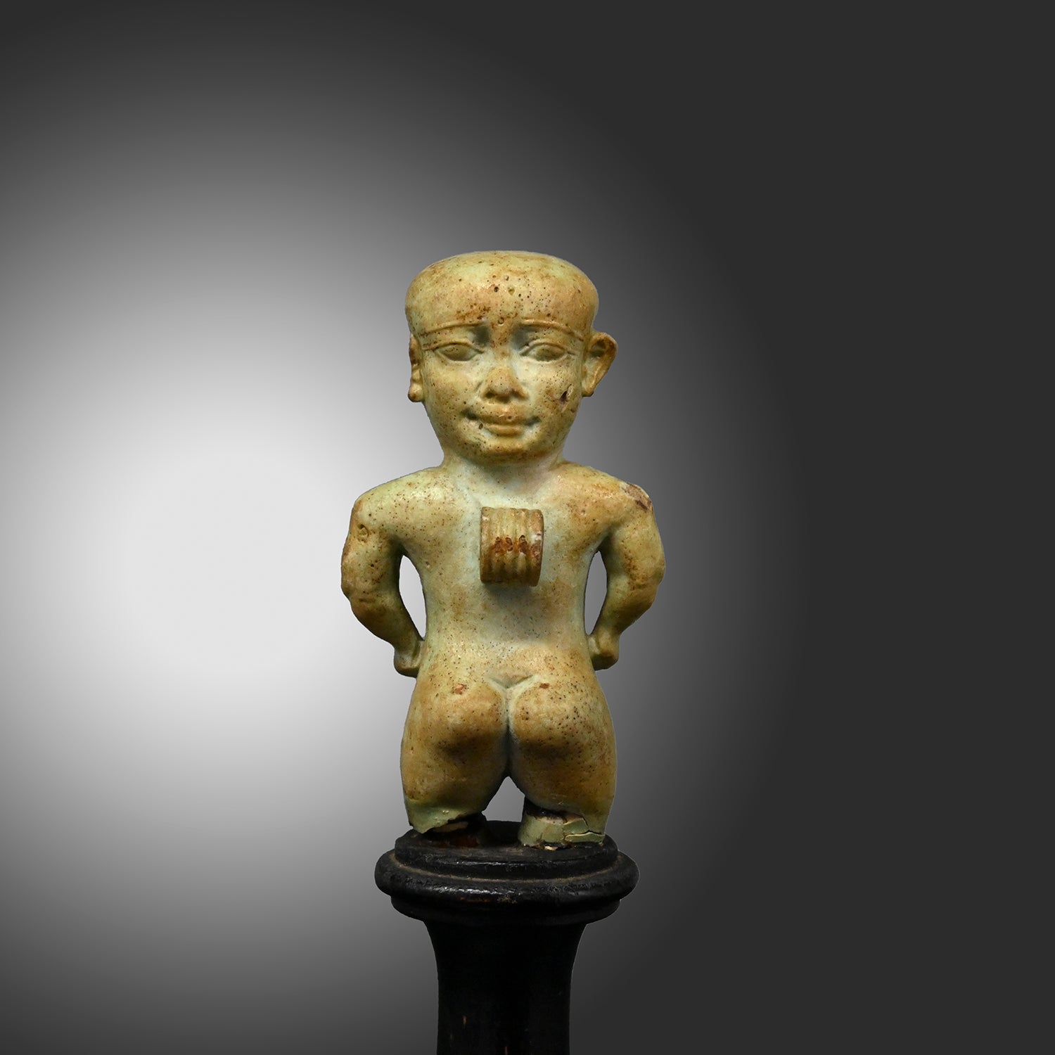 A fine Egyptian Faience Janus Amulet of Pataikos, Late Period, ca. 664 - 332 BCE