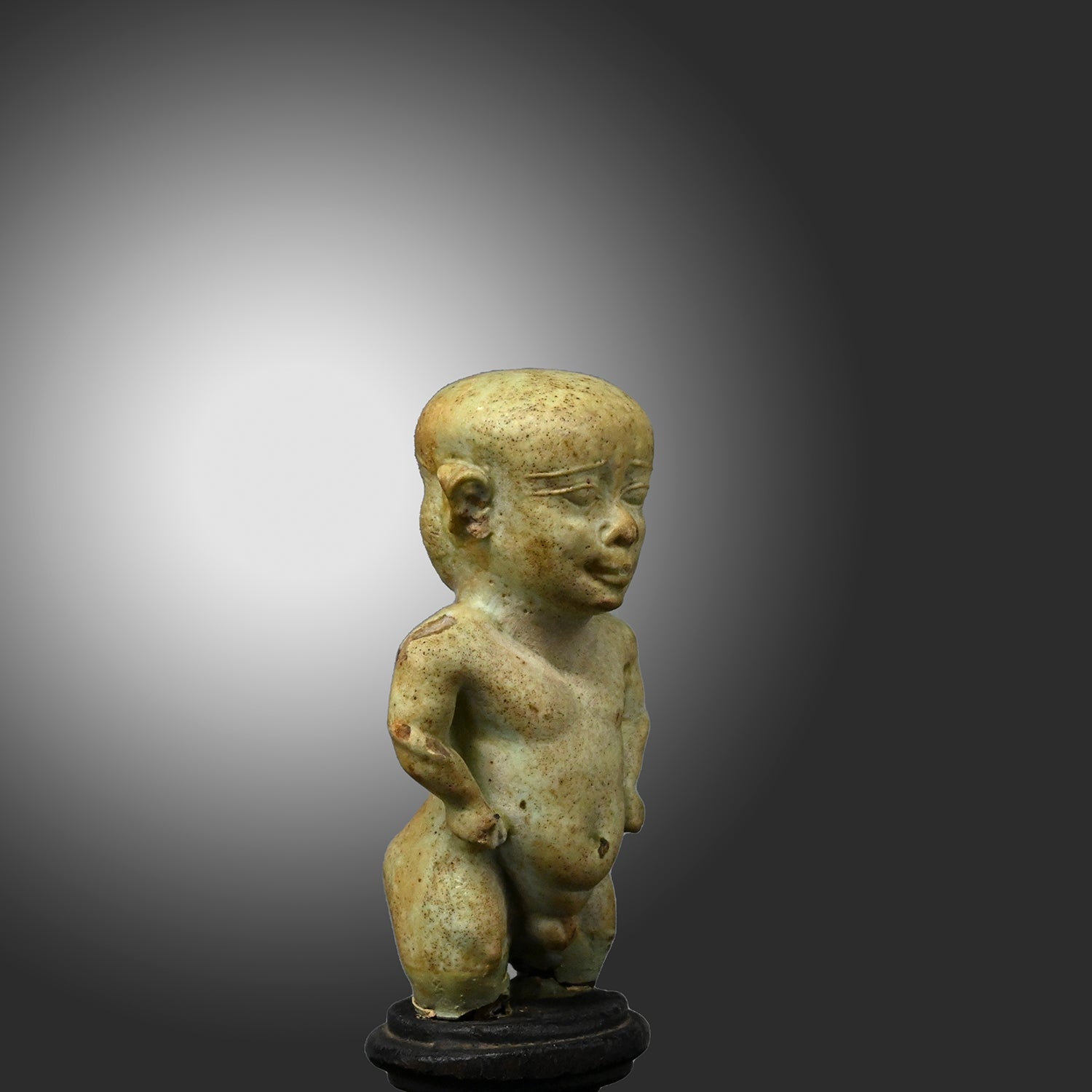 A fine Egyptian Faience Janus Amulet of Pataikos, Late Period, ca. 664 - 332 BCE