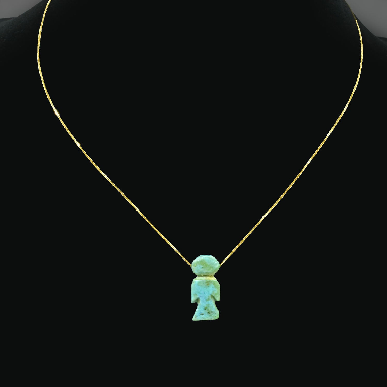 An Egyptian Faience Isis Knot Amulet set as a pendant, Late Period, ca. 664 - 332 BCE