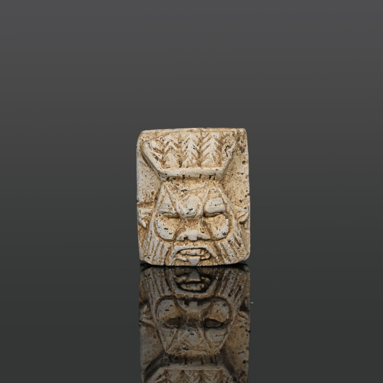 A large Egyptian Steatite Plaque of the god Bes, Late Period, ca. 664 - 332 BCE