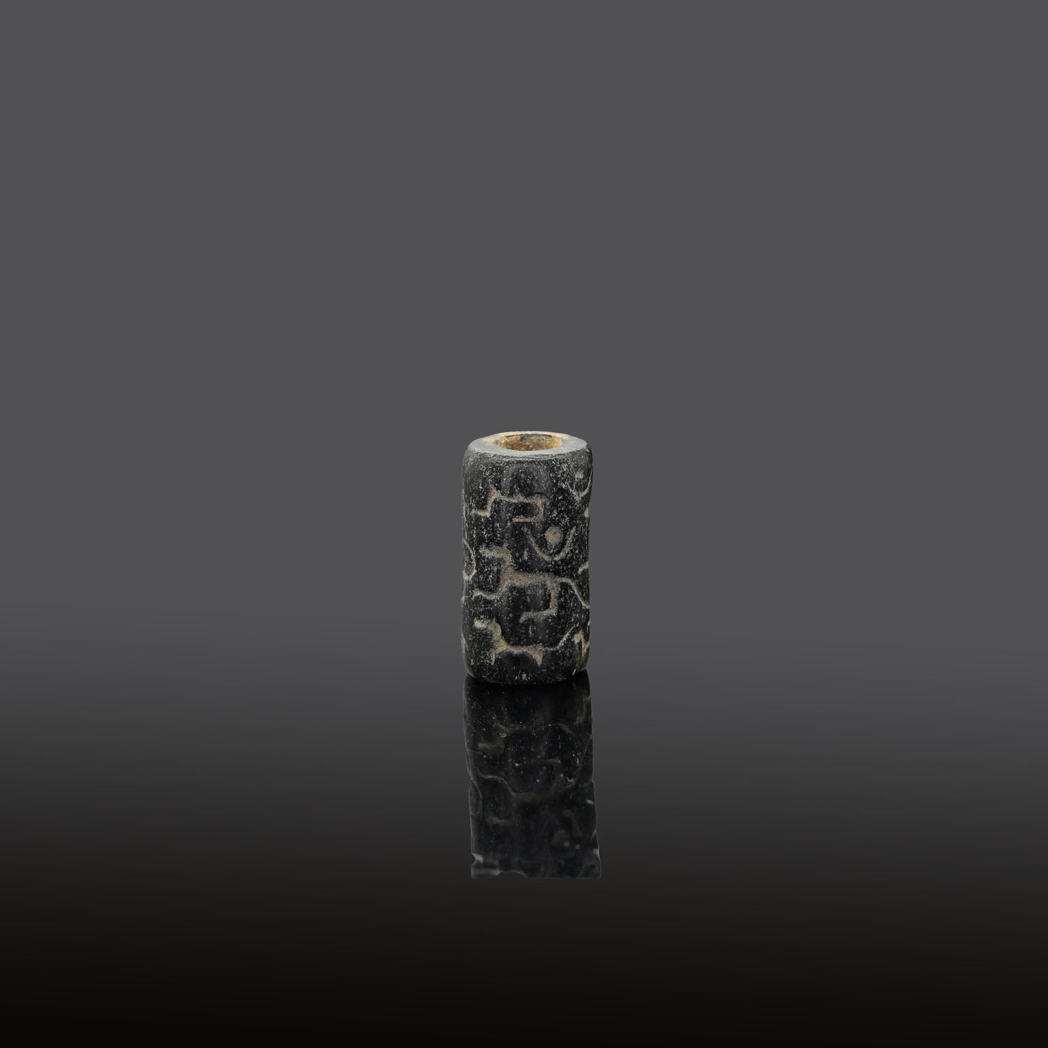 A rare Egyptian Steatite Cylinder Seal with Anubis, Early Dynastic Period - Old Kingdom, ca. 3000 - 2750 BCE