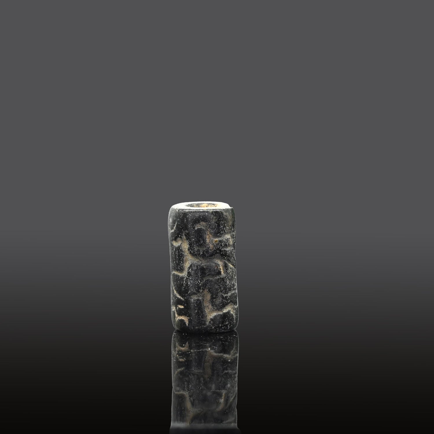 A rare Egyptian Steatite Cylinder Seal with Anubis, Early Dynastic Period - Old Kingdom, ca. 3000 - 2750 BCE