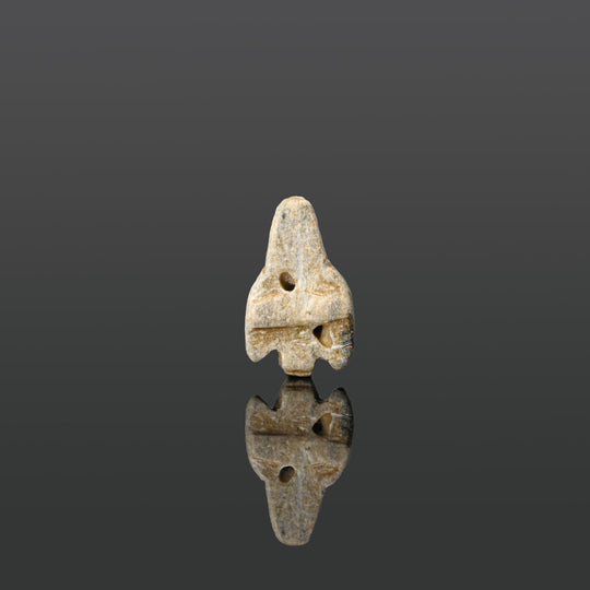 An Egyptian Steatite Jackal Head Amulet, Middle Kingdom, ca. 2070 - 1600 BCE