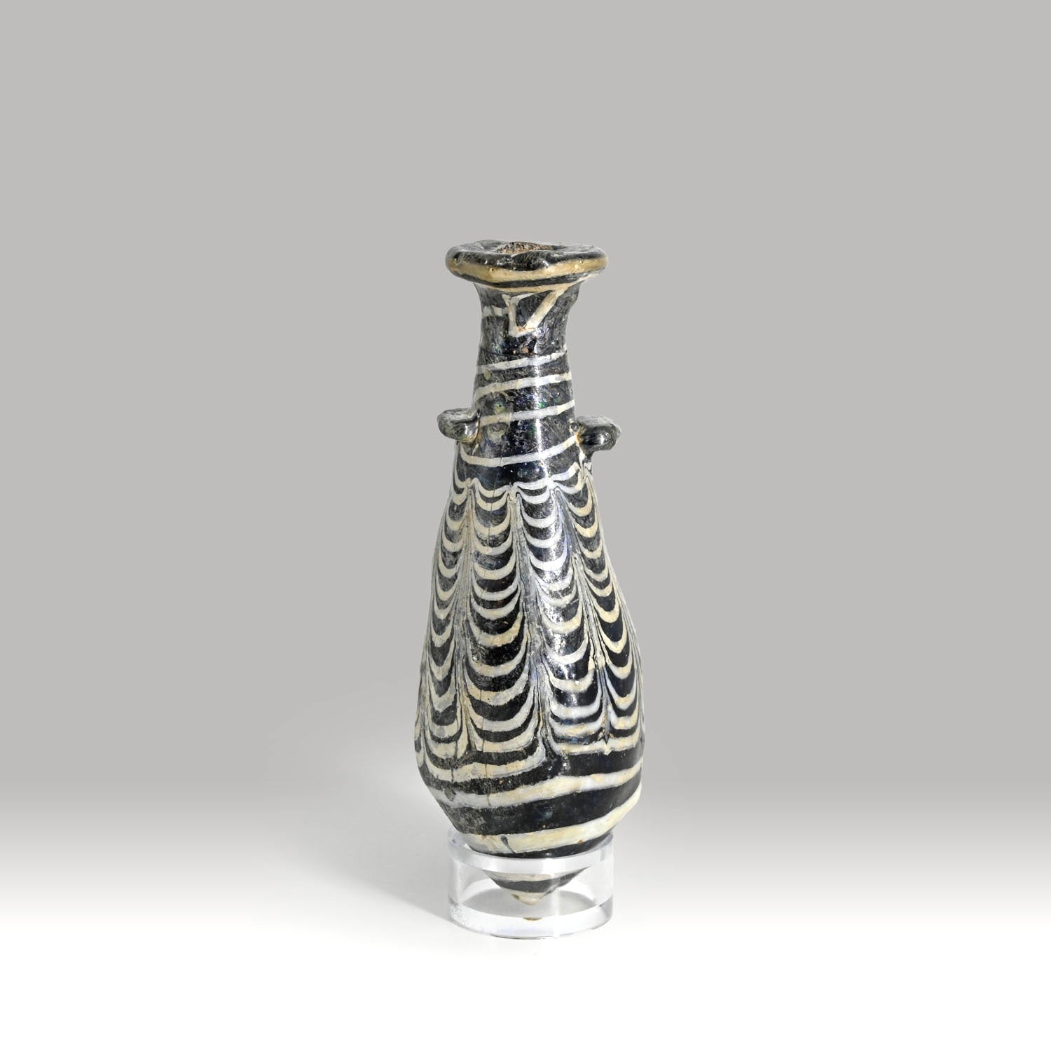 An Egyptian Core-Formed Glass Alabastron, Ptolemaic Period, ca. 3rd - 2nd century BCE