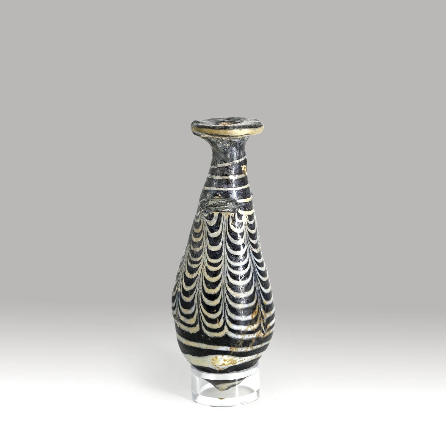 An Egyptian Core-Formed Glass Alabastron, Ptolemaic Period, ca. 3rd - 2nd century BCE