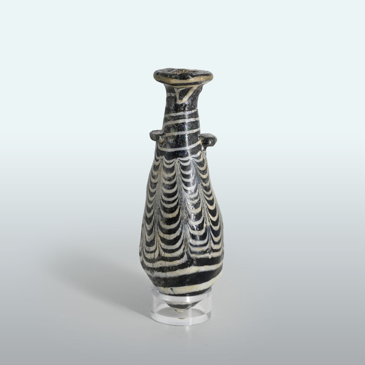 An Egyptian Core-Formed Glass Alabastron, Ptolemaic Period, ca. 3rd - 2nd century BCE