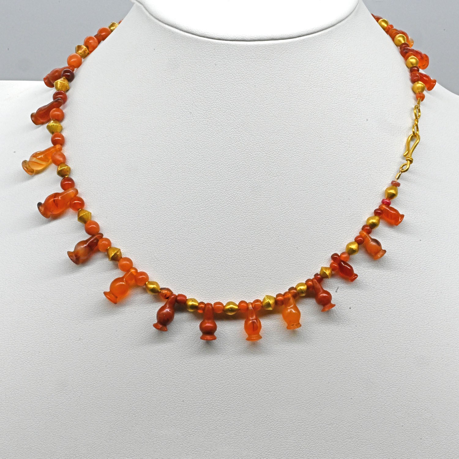An Egyptian Carnelian, Red Jasper and Gold Bead Necklace, late 18th Dynasty, ca. 1350 - 1295 BCE