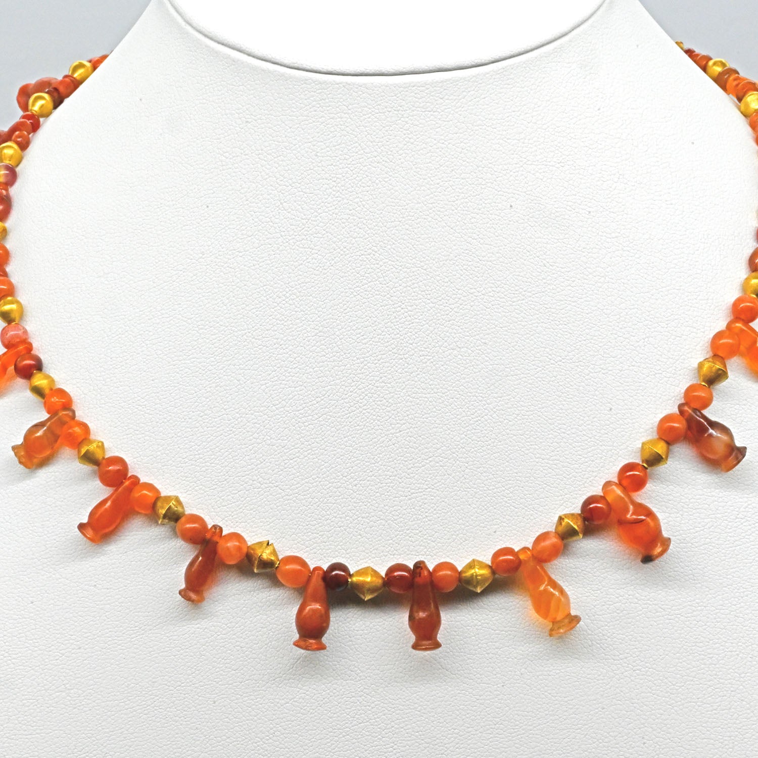 An Egyptian Carnelian, Red Jasper and Gold Bead Necklace, late 18th Dynasty, ca. 1350 - 1295 BCE