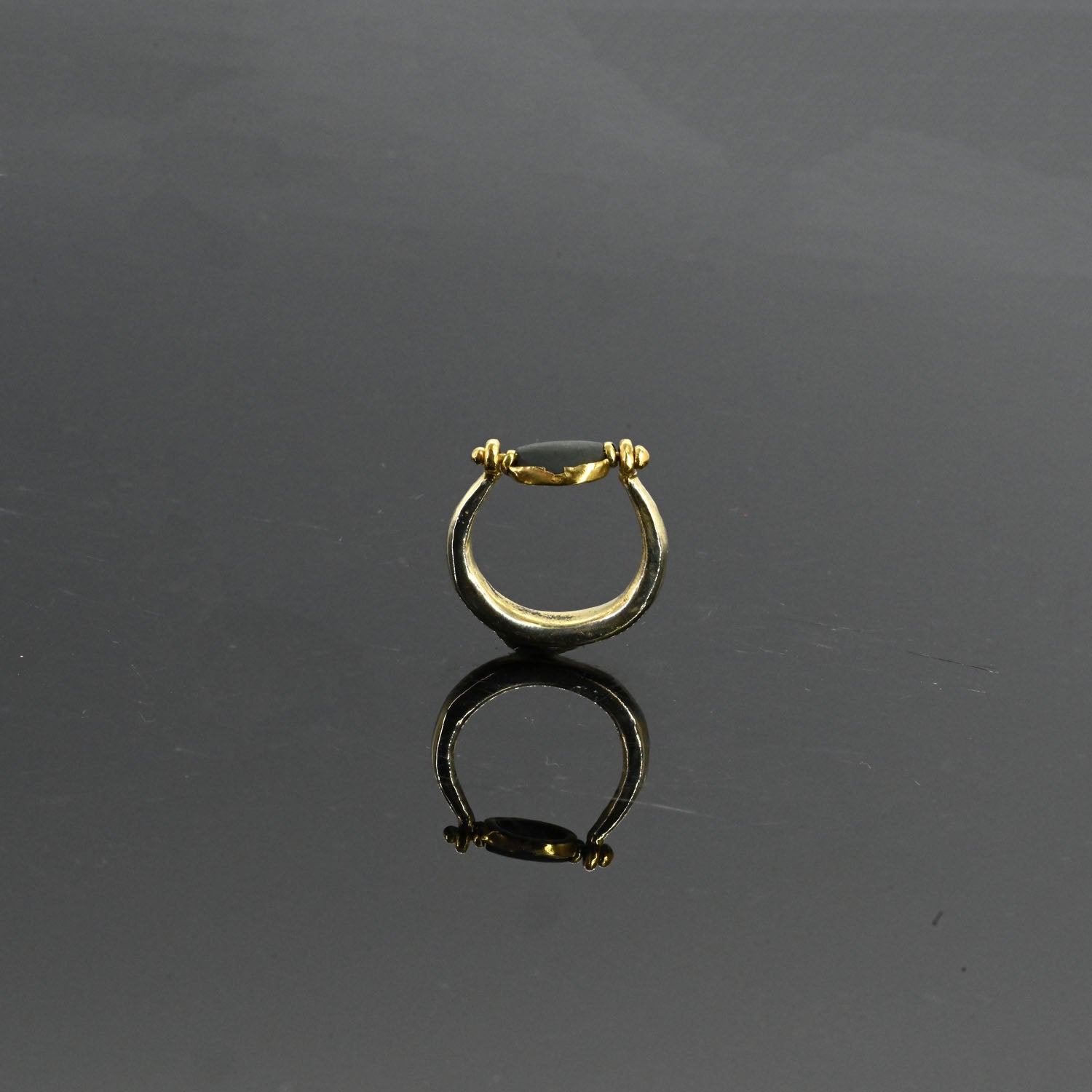 An Egyptian Scaraboid Gold Swivel Ring, New Kingdom, 18th Dynasty, ca. 1550 - 1295 BCE