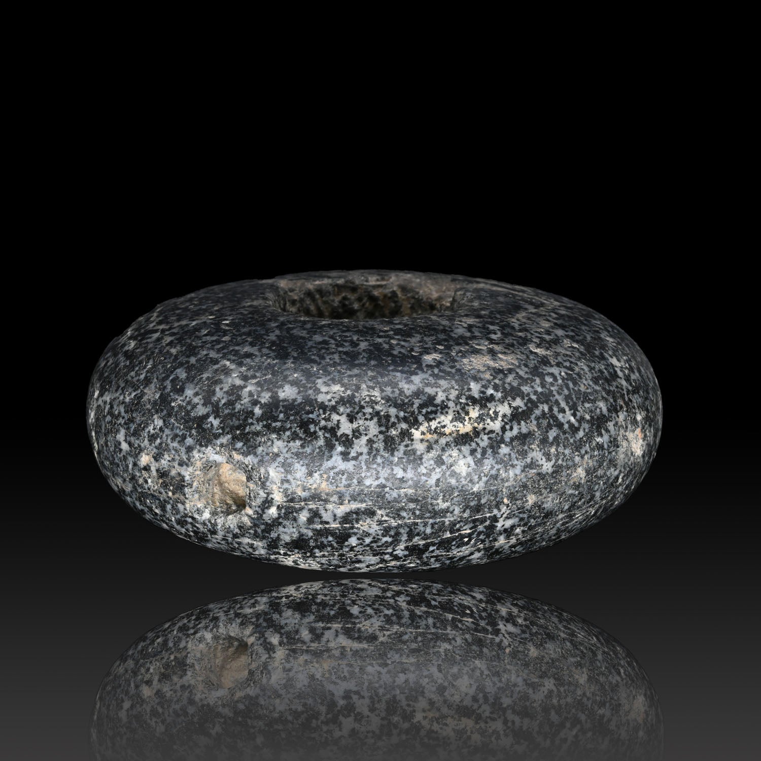 A Large Egyptian Diorite Rotary Grinding Stone, Old Kingdom, ca. 2543-1980 BCE