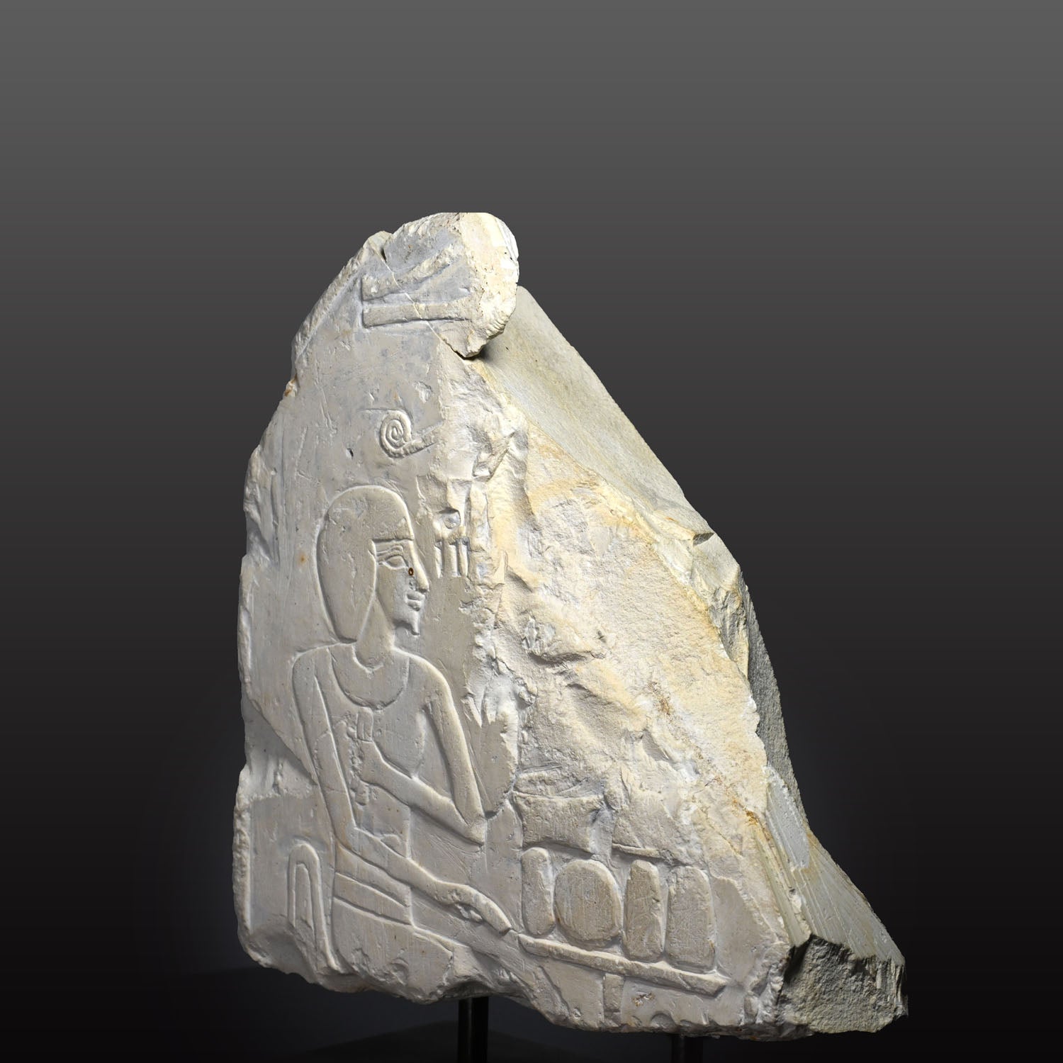 An Egyptian Limestone Stele Fragment, New Kingdom, early 18th Dynasty, Reign of Ahhotep I (c. 1575-1530 BCE) - Amenhotep I (c. 1525-1504 BCE)