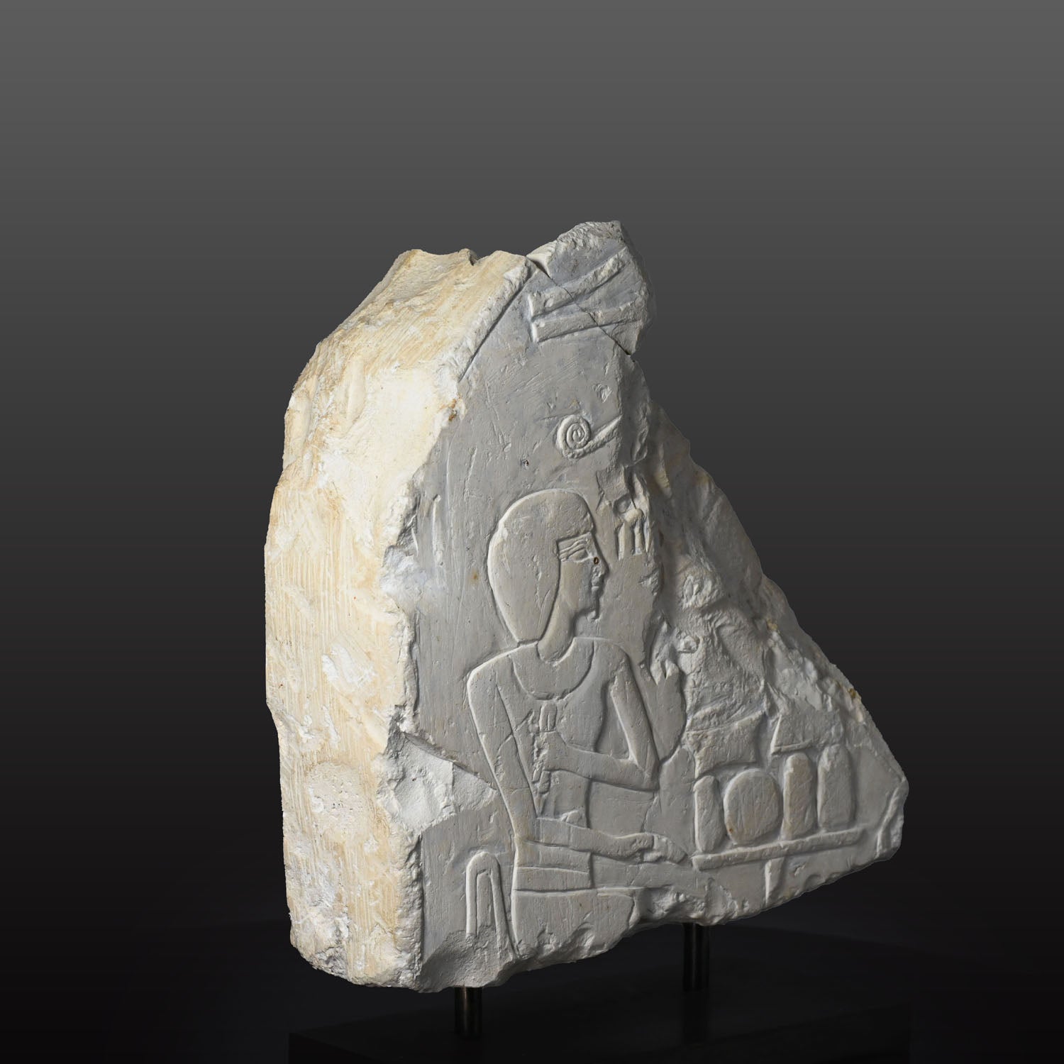 An Egyptian Limestone Stele Fragment, New Kingdom, early 18th Dynasty, Reign of Ahhotep I (c. 1575-1530 BCE) - Amenhotep I (c. 1525-1504 BCE)