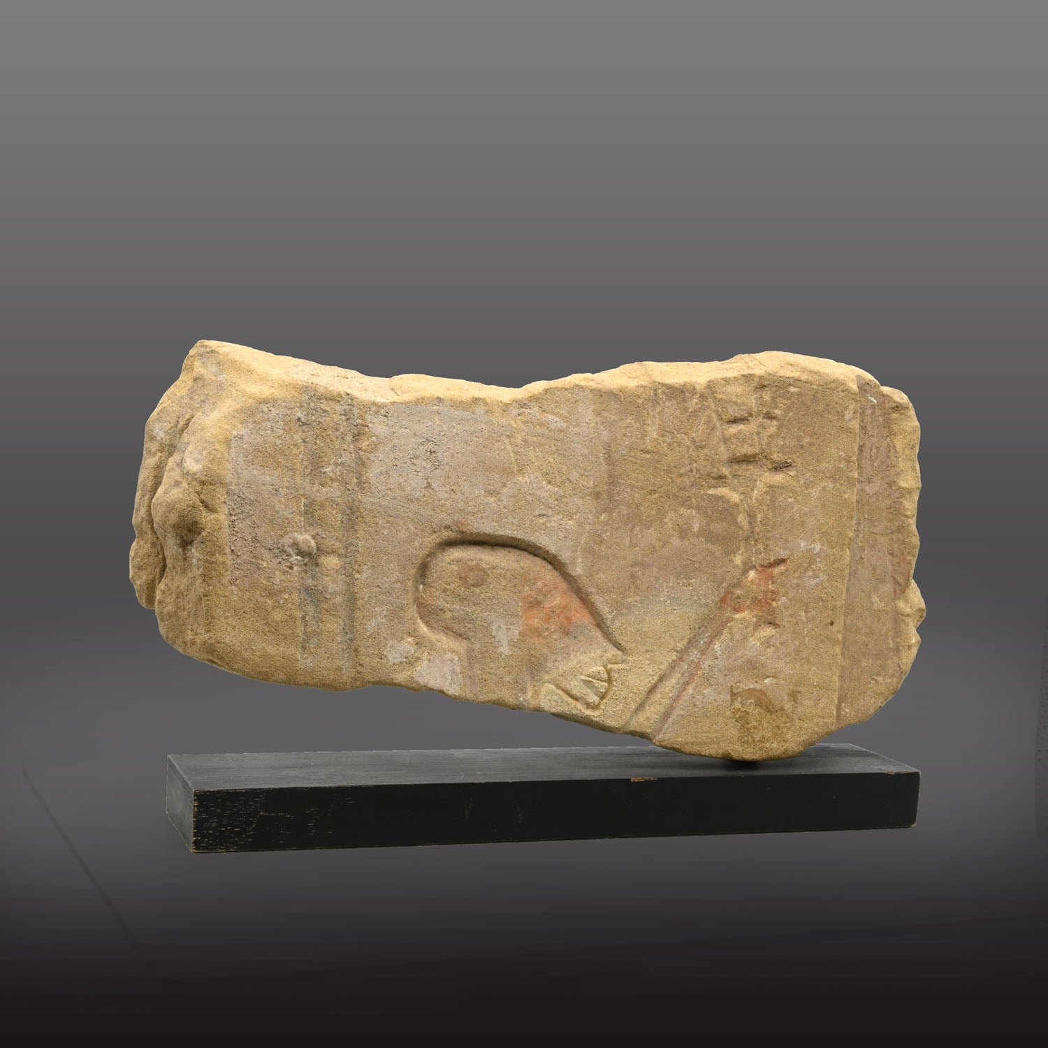A Published Amarna Sandstone Relief Fragment Depicting Merit-Aten Holding a Sistrum, Amarna Period, ca. 1379 – 1362 BCE,