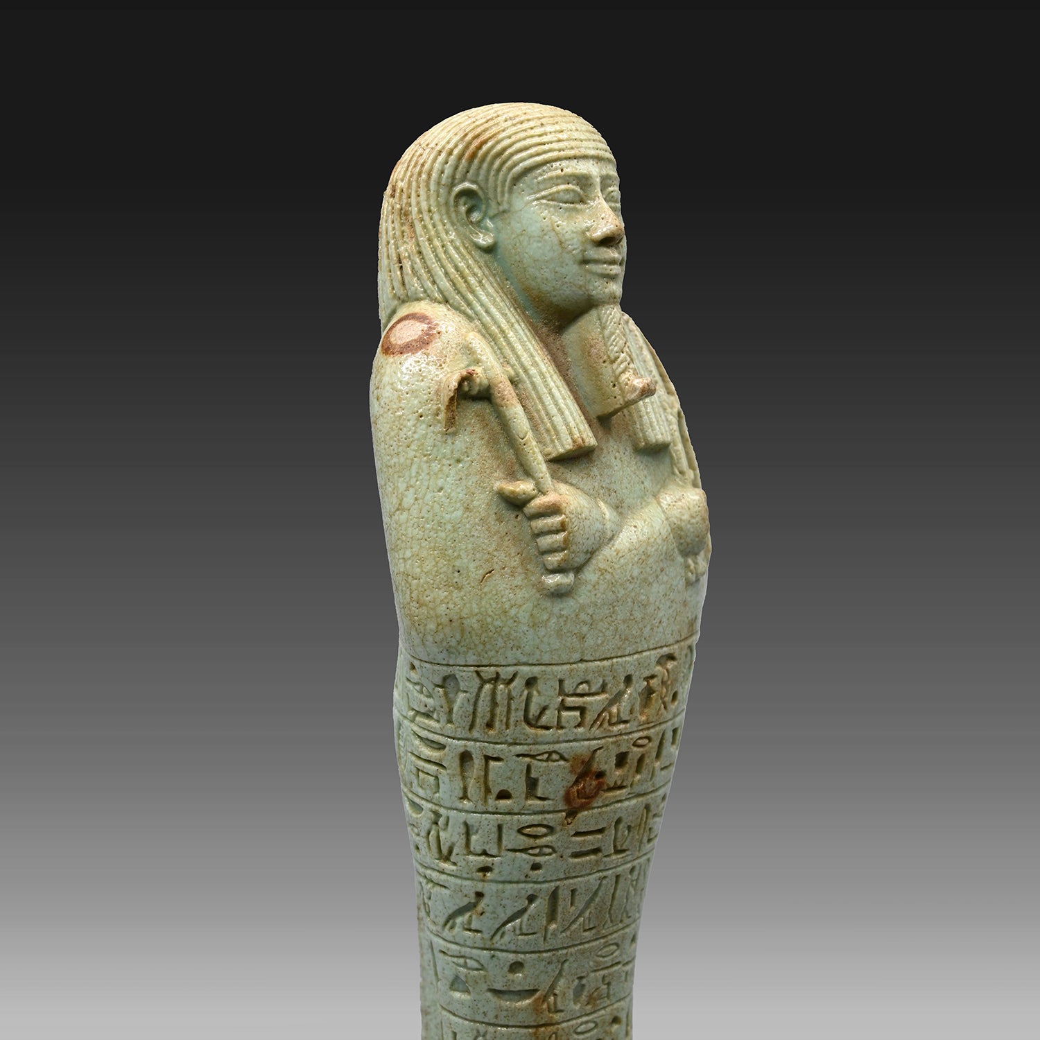 An exceptional Egyptian Faience Ushabti for Wah-ib-re-em-akhet, 26th Dynasty, 664 - 525 BC