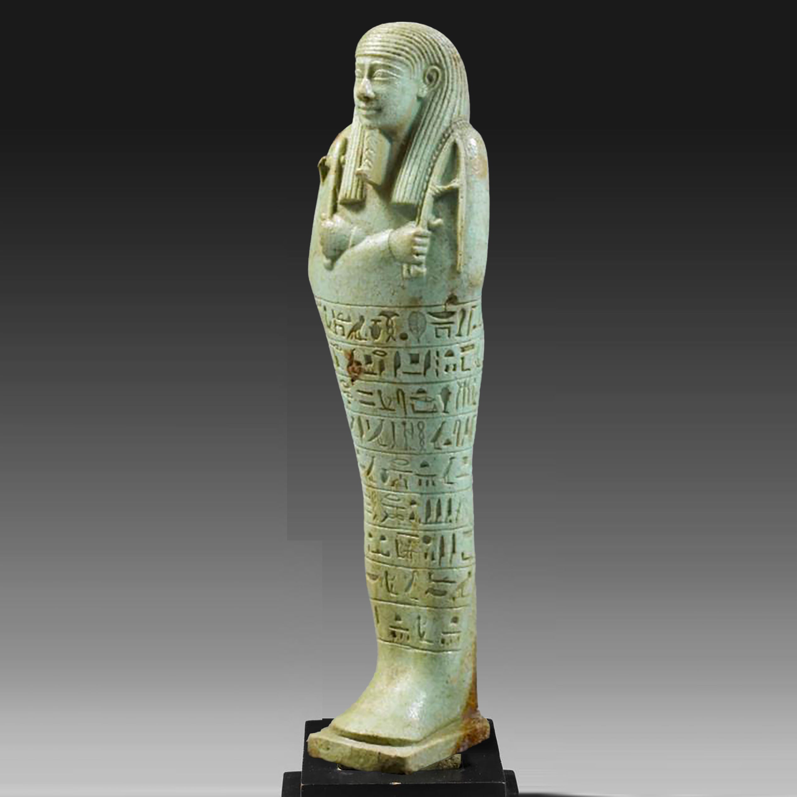 An exceptional Egyptian Faience Ushabti for Wah-ib-re-em-akhet, 26th Dynasty, 664 - 525 BC