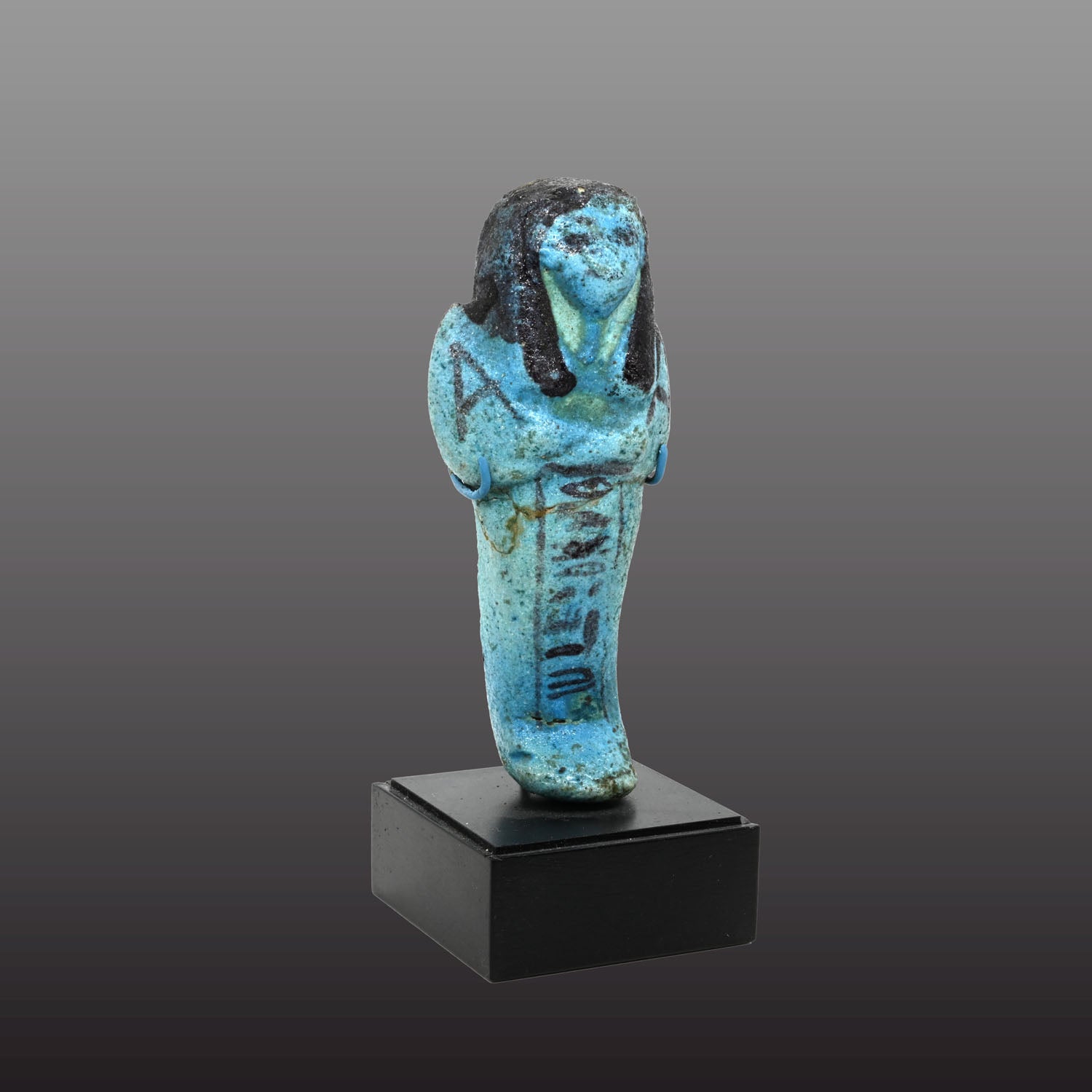 An Egyptian bright blue glazed shabti for Meret-Amun, 21st Dynasty, Thebes, Deir el Bahri Cache II, ca. 990 - 970 BCE