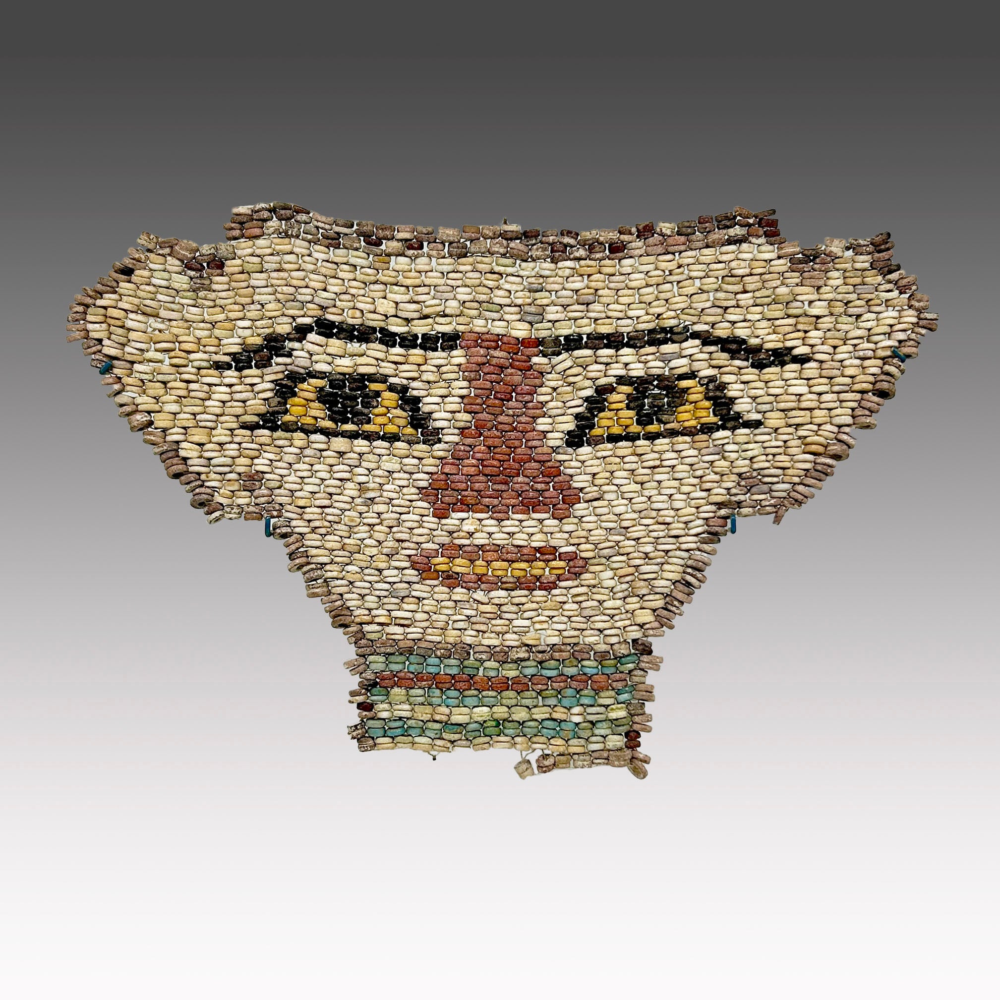 An Egyptian Faience Beadwork Mummy Mask, Late Period, ca. 664 - 332 BCE