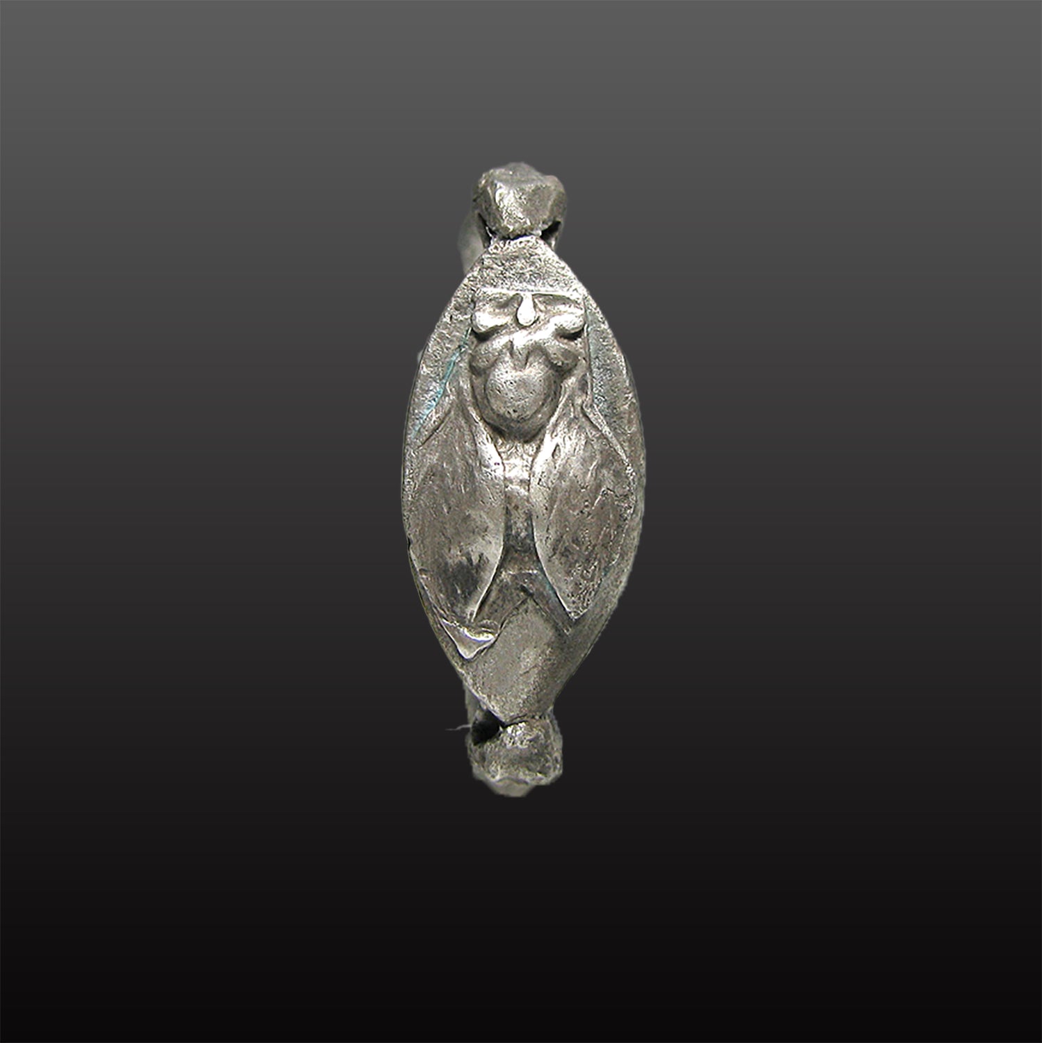 A Rare Greek Silver Ring with Cicada and Serpent Motif, Archaic Period, ca. 6th - 5th century BCE