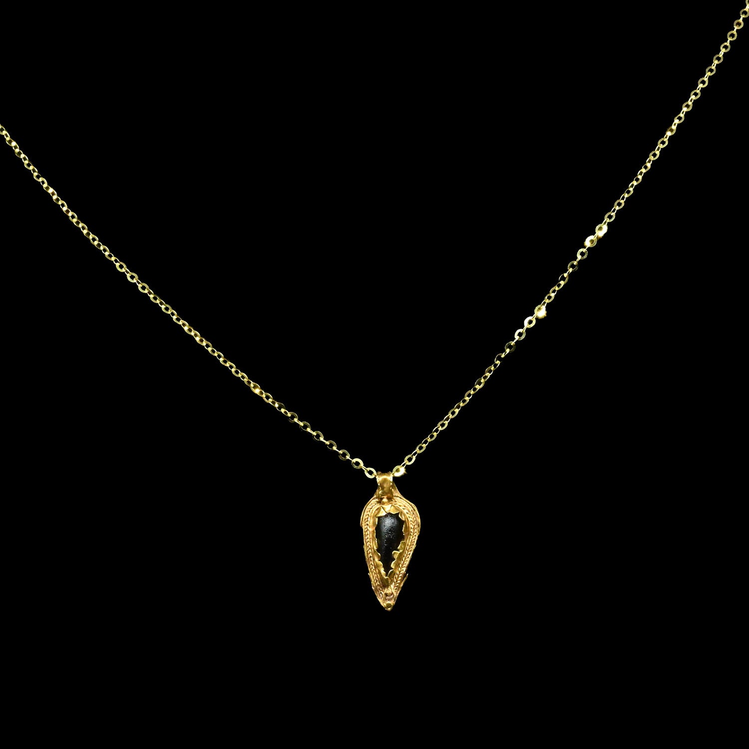 A Hellenistic Gold and Garnet Pendant, Hellenistic Period, ca. 3rd - 1st century BCE