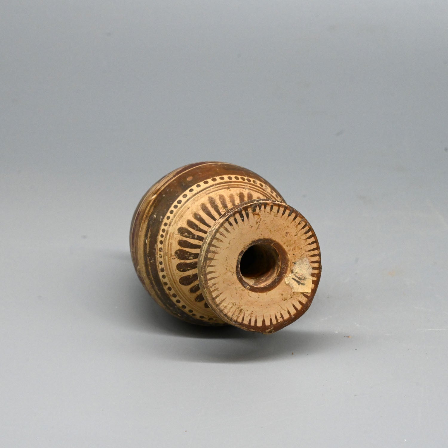 An Etrusco-Corinthian Piriform Aryballos, ca. 6th century BCE