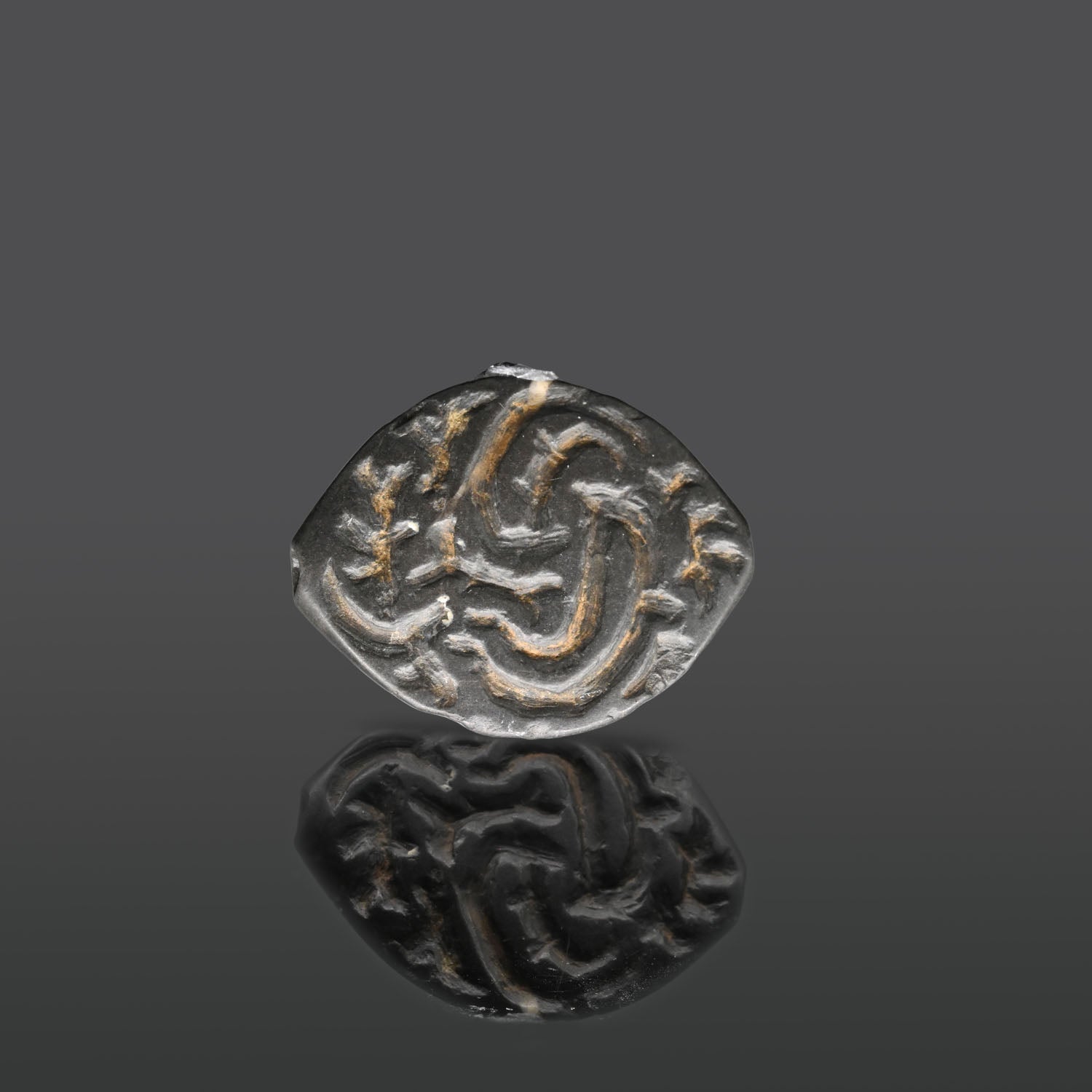 A superb Mesopotamian Serpentine Stamp Seal, Uruk Period, ca. 4000 - 3000 BCE