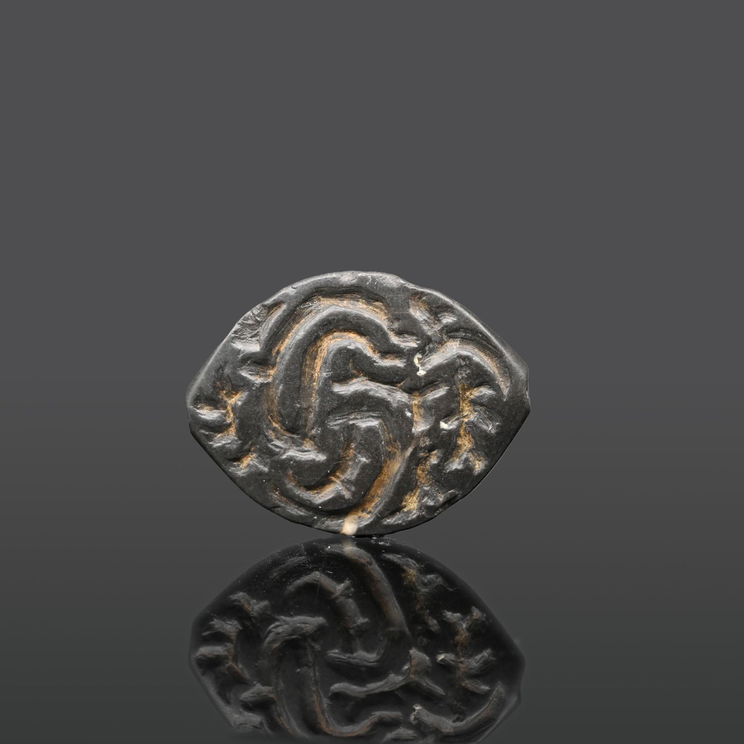 A superb Mesopotamian Serpentine Stamp Seal, Uruk Period, ca. 4000 - 3000 BCE
