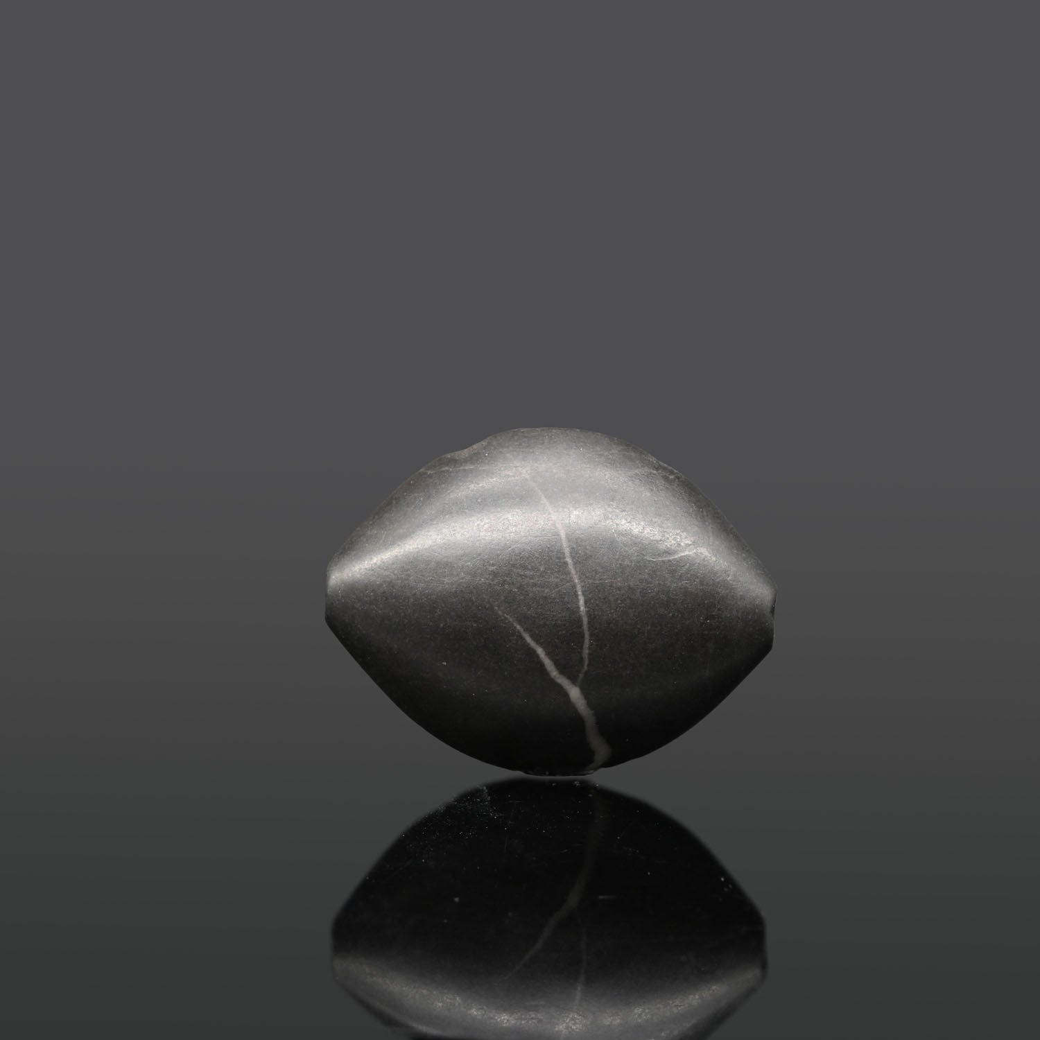 A superb Mesopotamian Serpentine Stamp Seal, Uruk Period, ca. 4000 - 3000 BCE