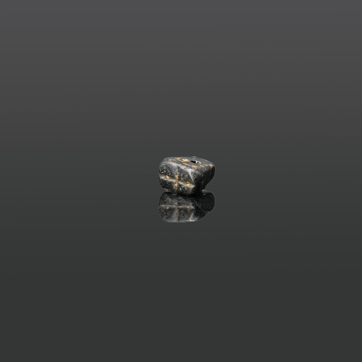 A Levantine Black Serpentine Seal, ca. late 2nd - early 1st millennium BCE