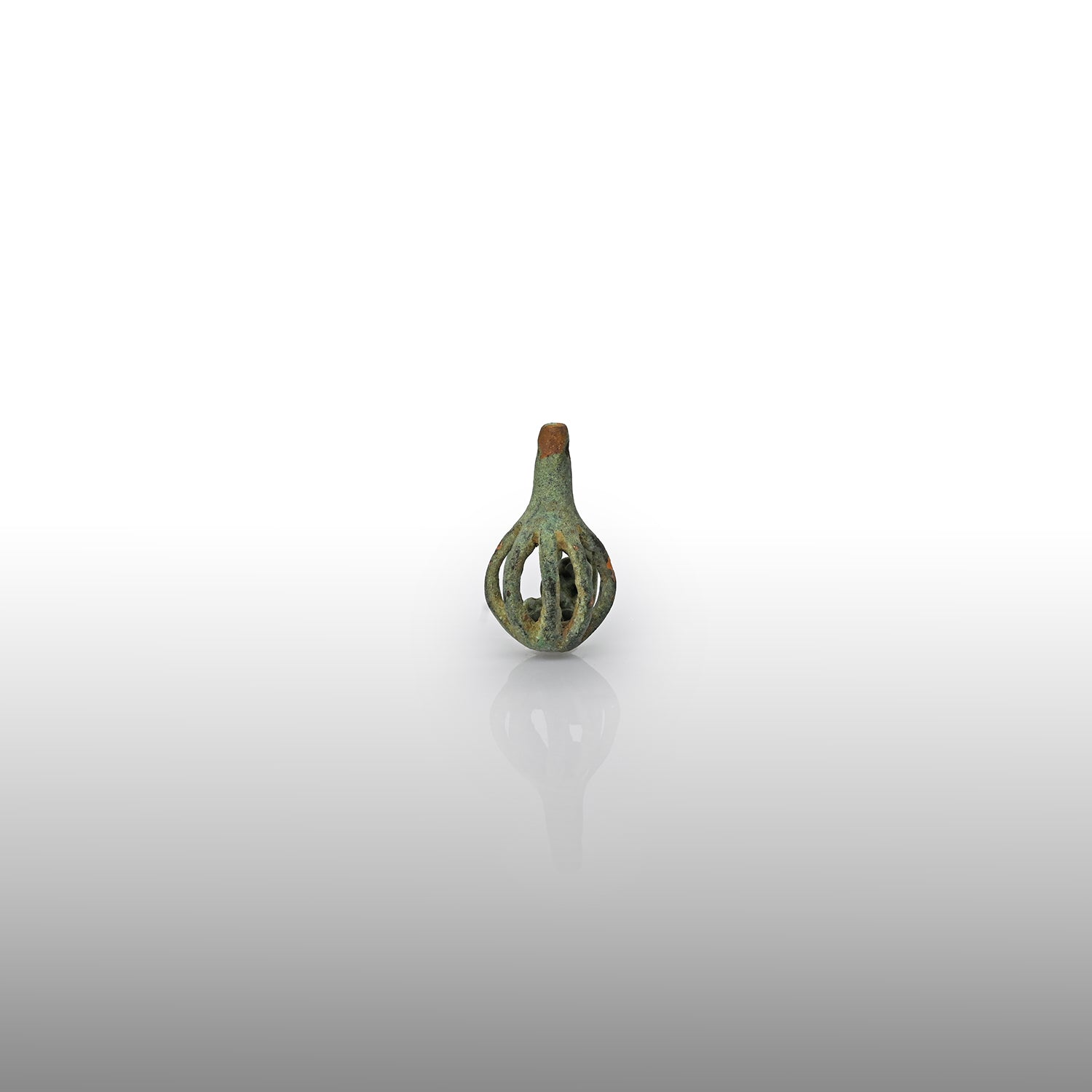 A small Luristan bronze openwork Harness Bell, ca. 1000 – 700 BCE