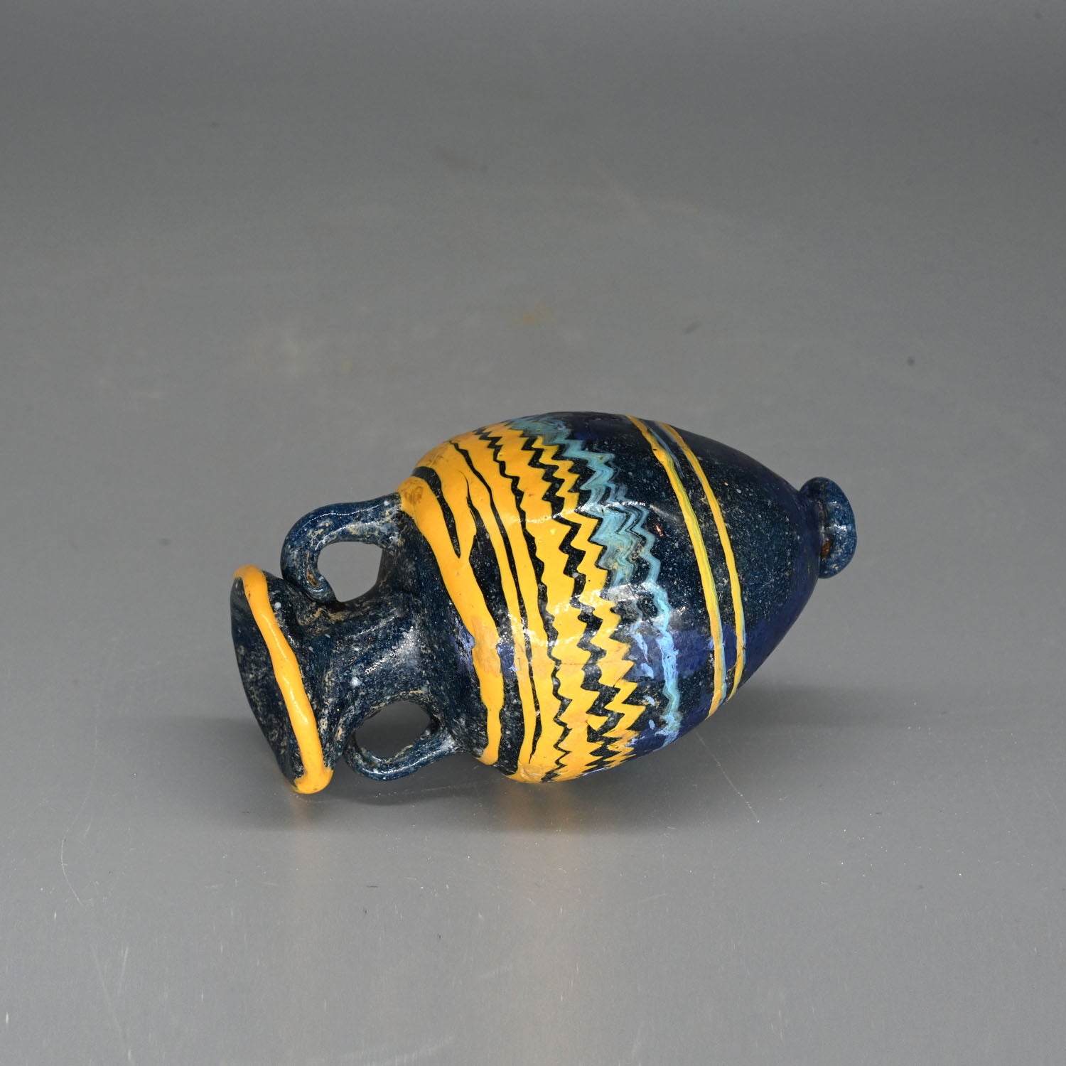 A Phoenician Core-Formed Glass Amphoriskos, ca. 6th - 5th century BCE